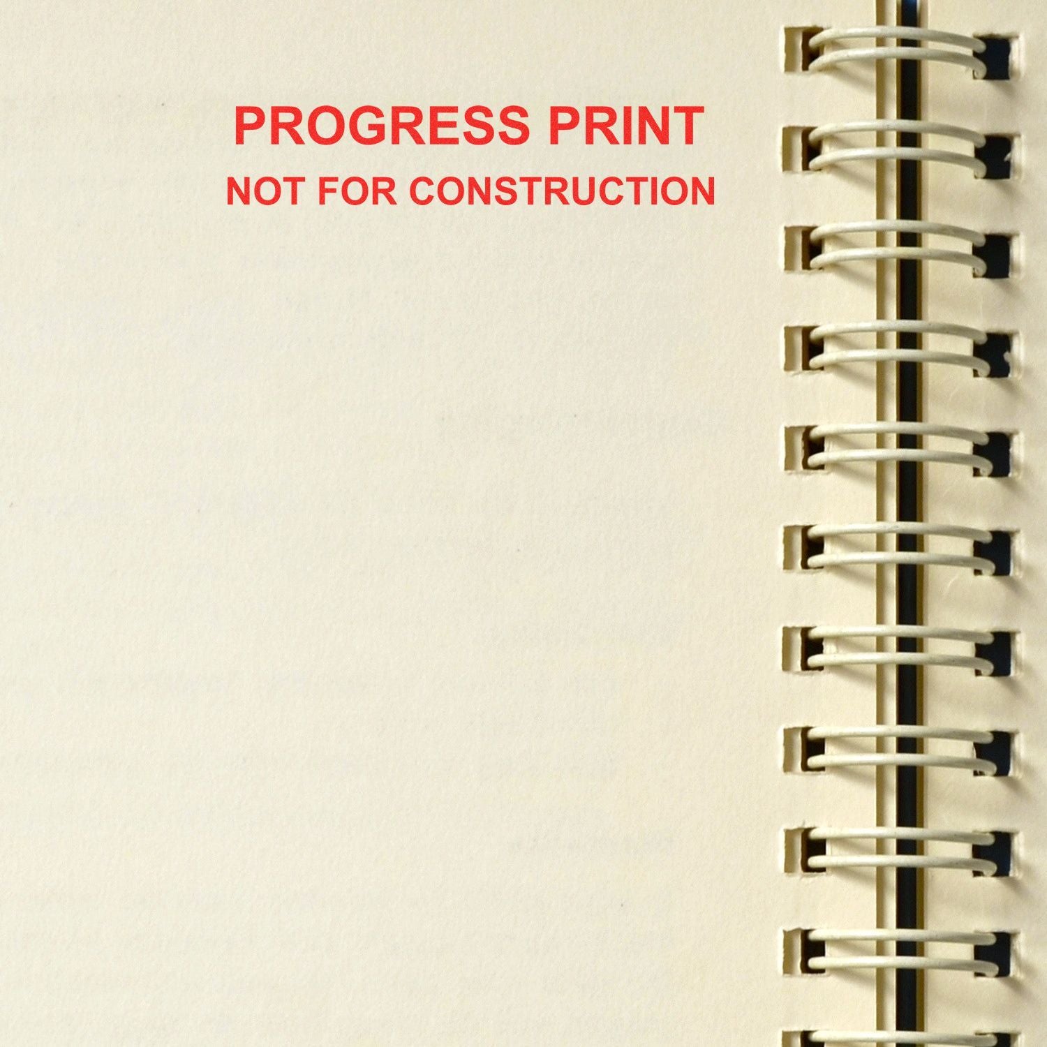 Spiral-bound progress print blueprint page labeled Not for Construction on white paper.