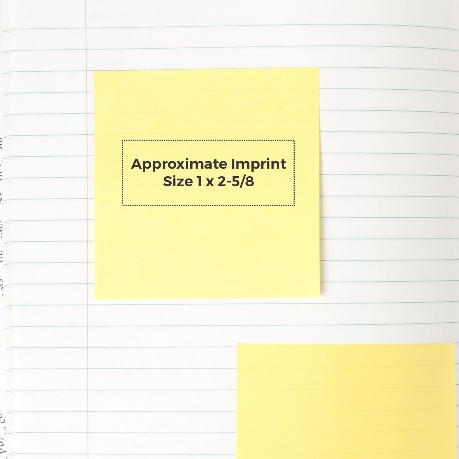 Yellow sticky note with “Approximate Imprint Size 1 x 2-5/8” on lined notebook paper, blank yellow sticky note partially visible below.