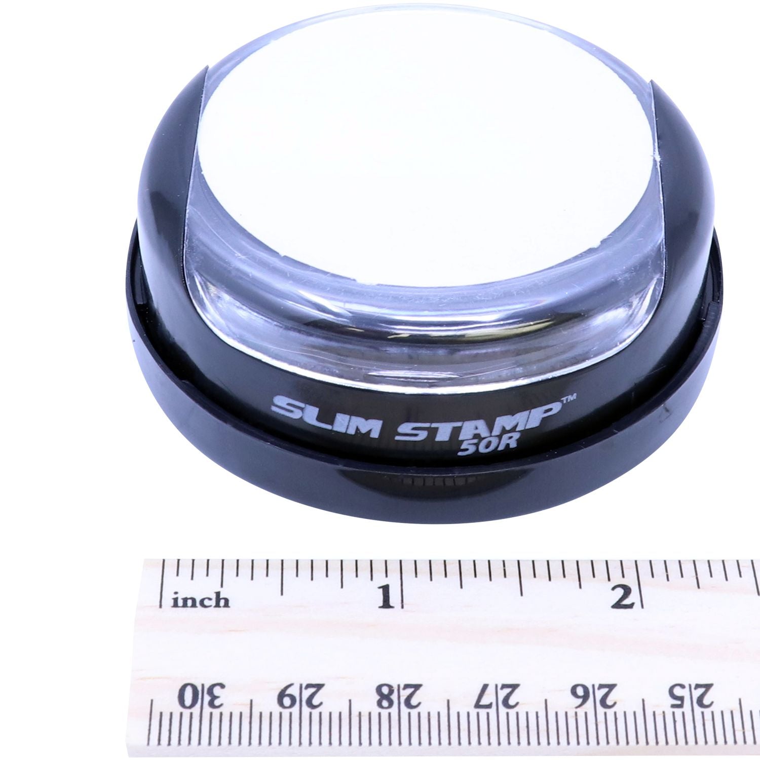 Black Slim Stamp 5-for label stamp head shown with inch ruler for size measurement