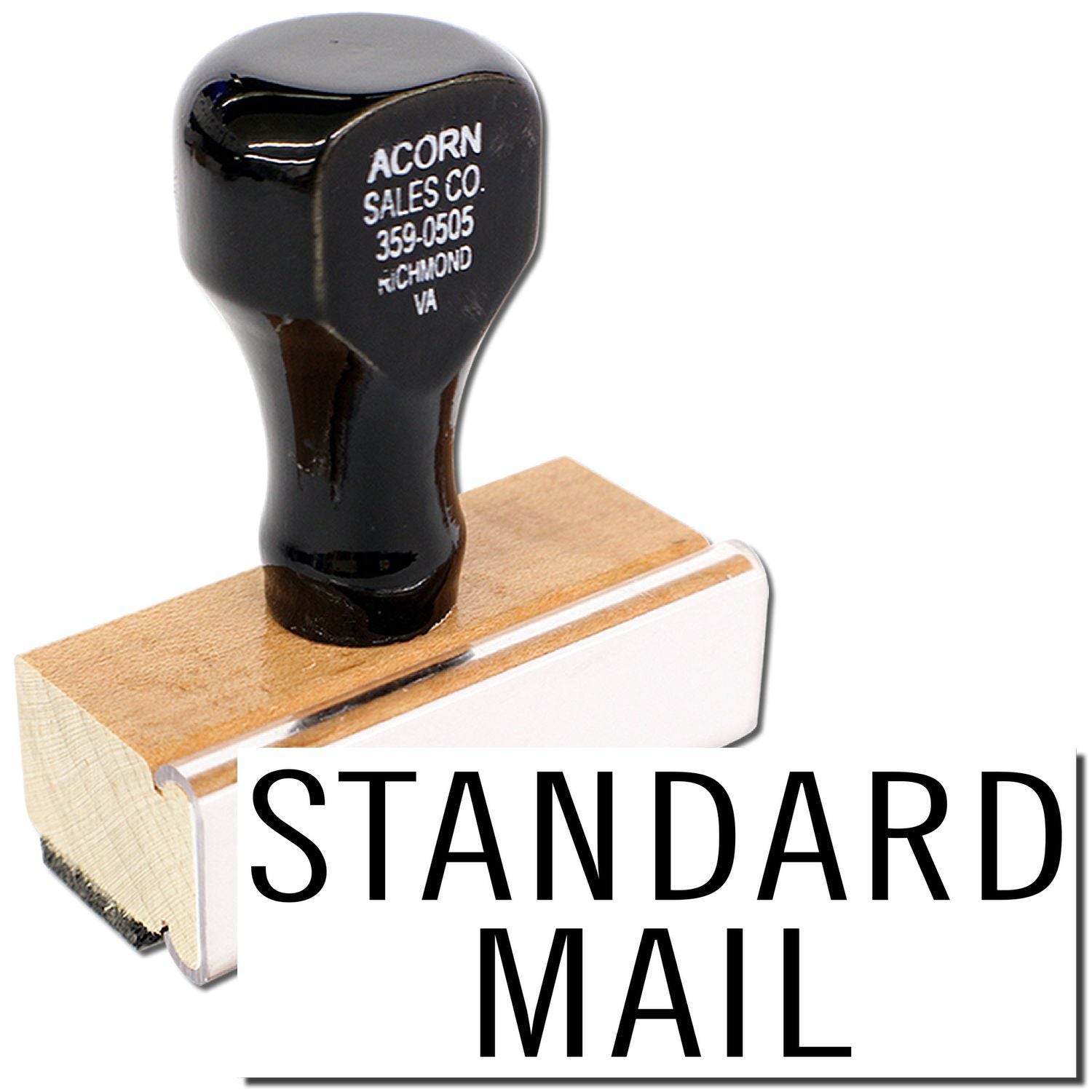 Standard mail rubber stamp with black handle and wooden base for office and mailing use