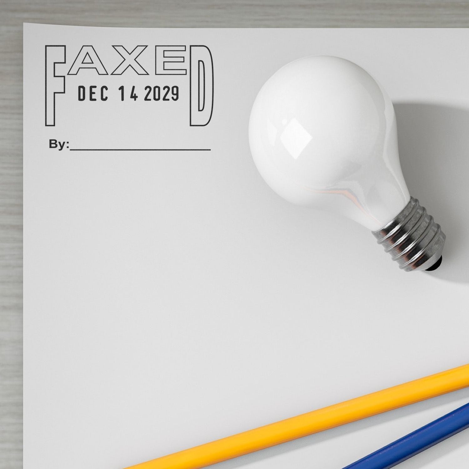 Blank fax cover sheet template with light bulb, pencils, and date field for office use