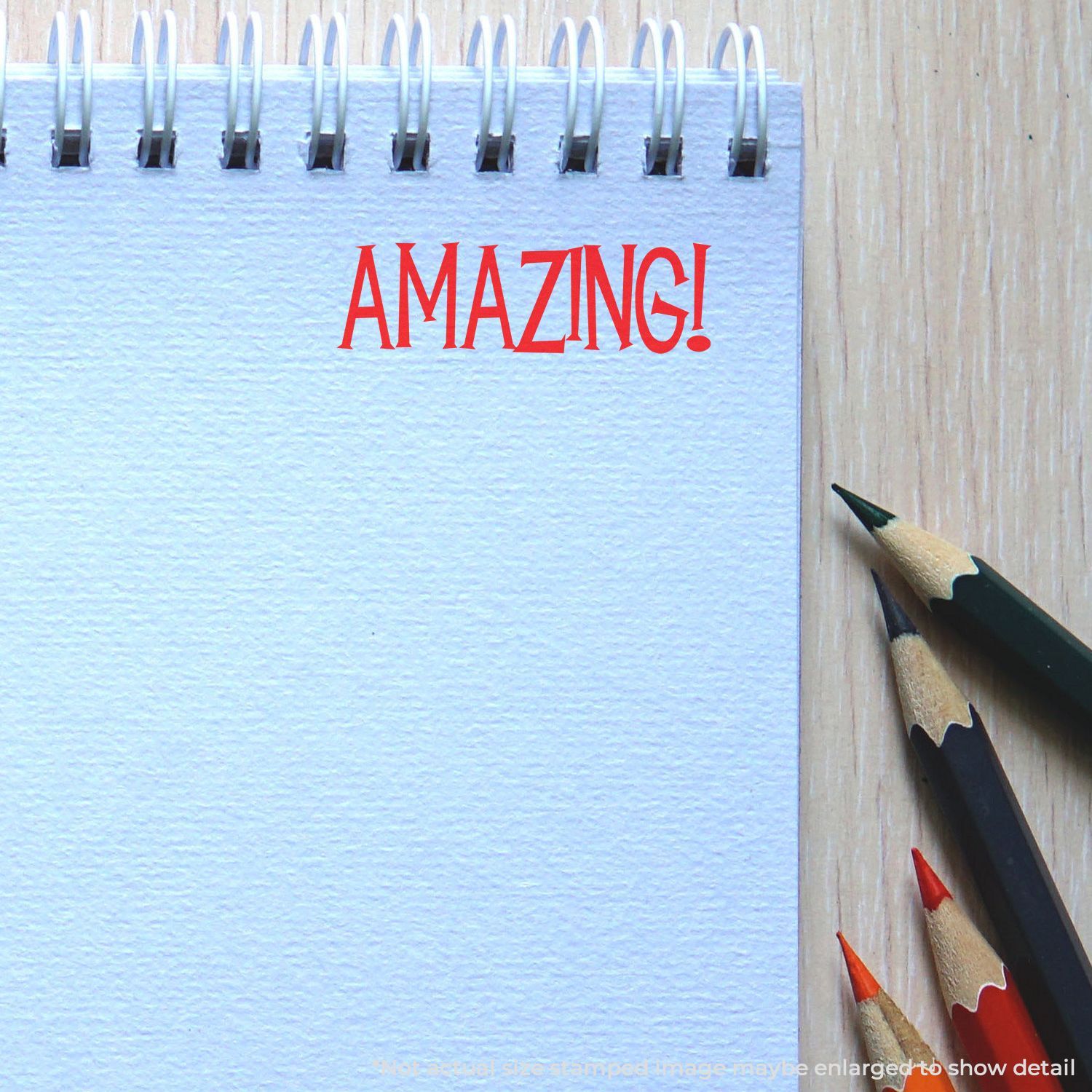 School supplies motivational image with red AMAZING! text on blue board and colored pencils at right edge