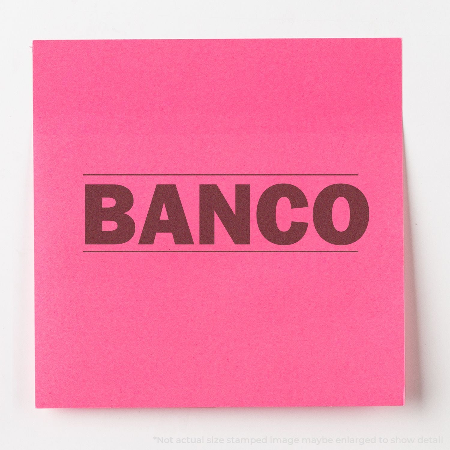 Pink card with large BANCO lettering, showcasing Banco branding and typography on a simple graphic design.