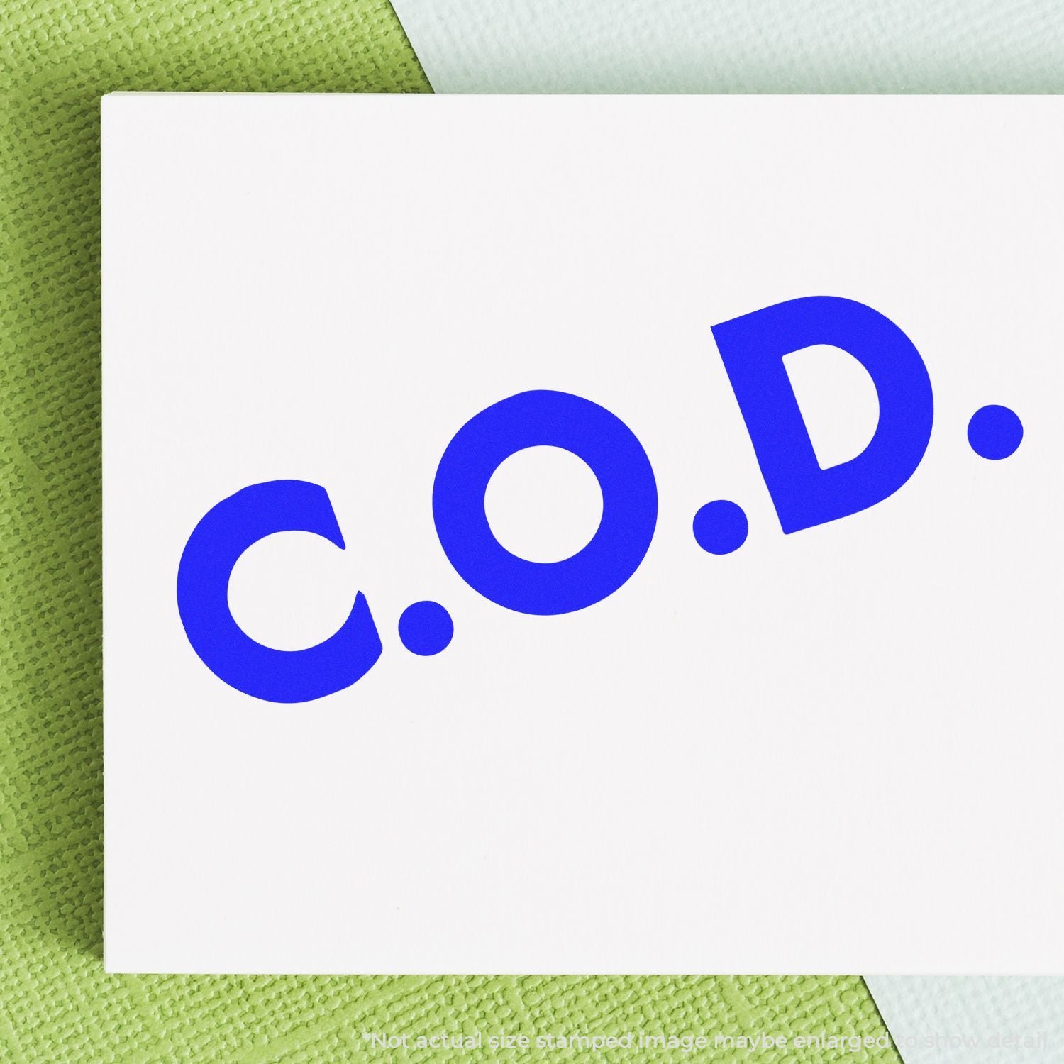 Blue C.O.D. logo on a white card against a green textured background.