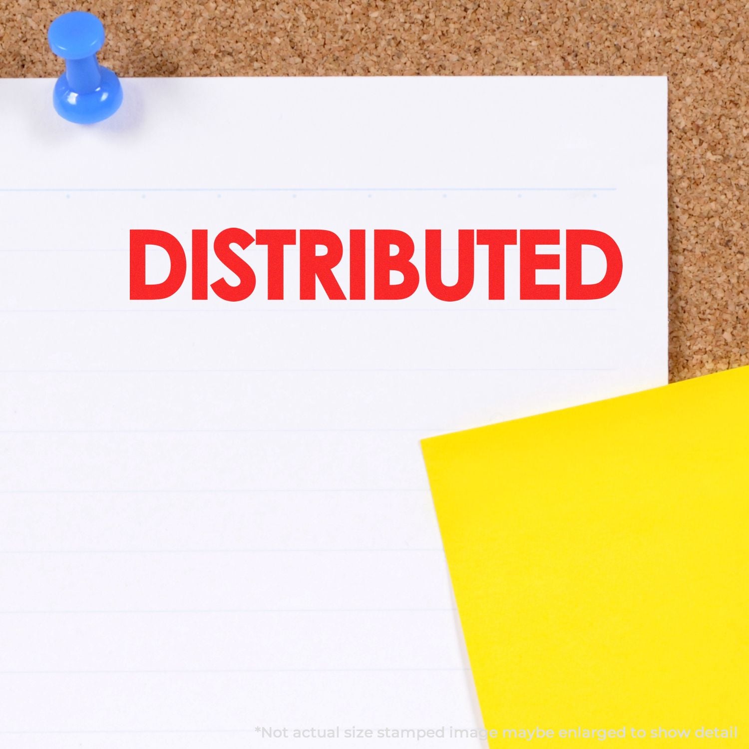 Corkboard bulletin pinned with blue tack showing DISTRIBUTED, representing distribution, delivery, and shared information.