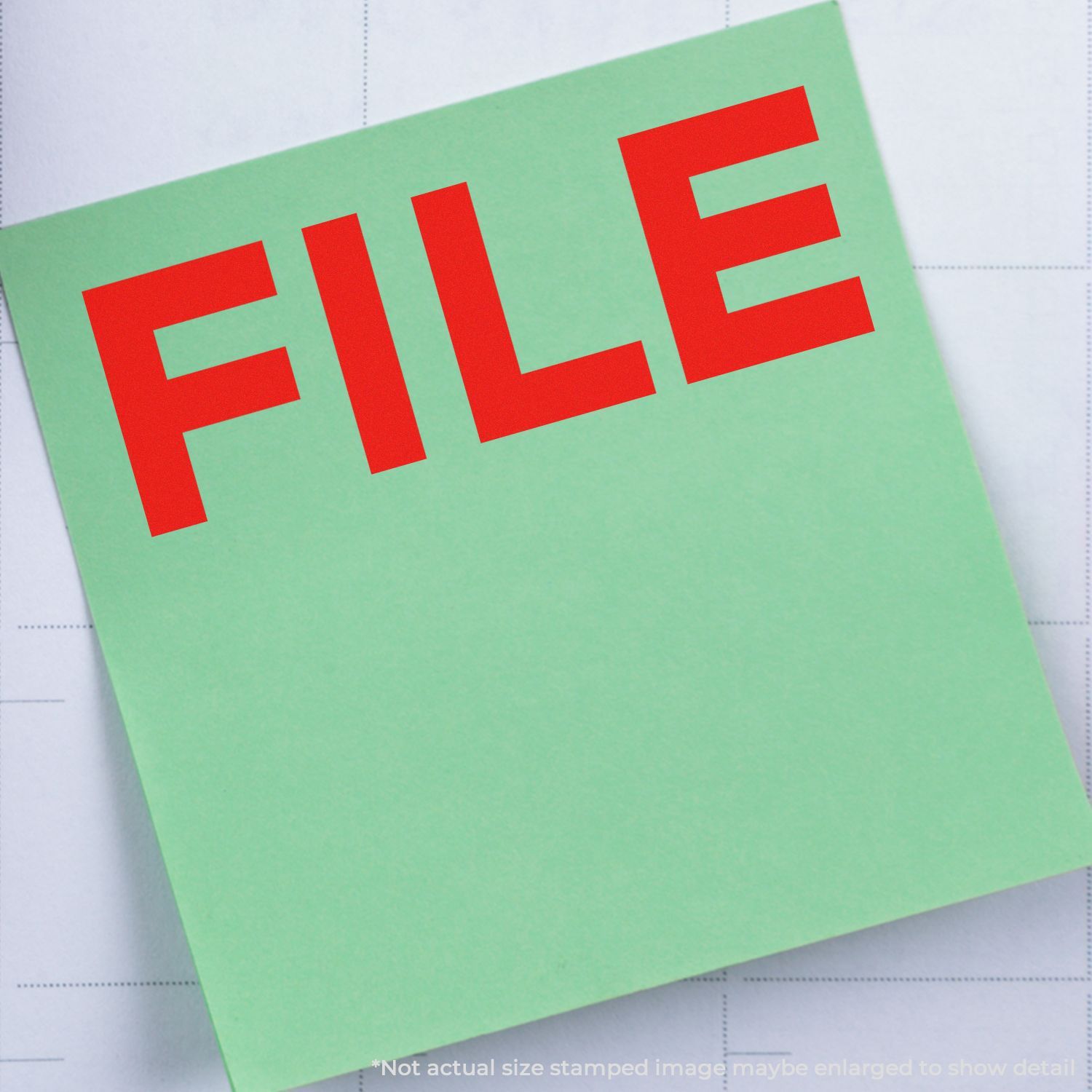 Red FILE text on green paper card, representing a document file or file management concept for SEO and labeling.