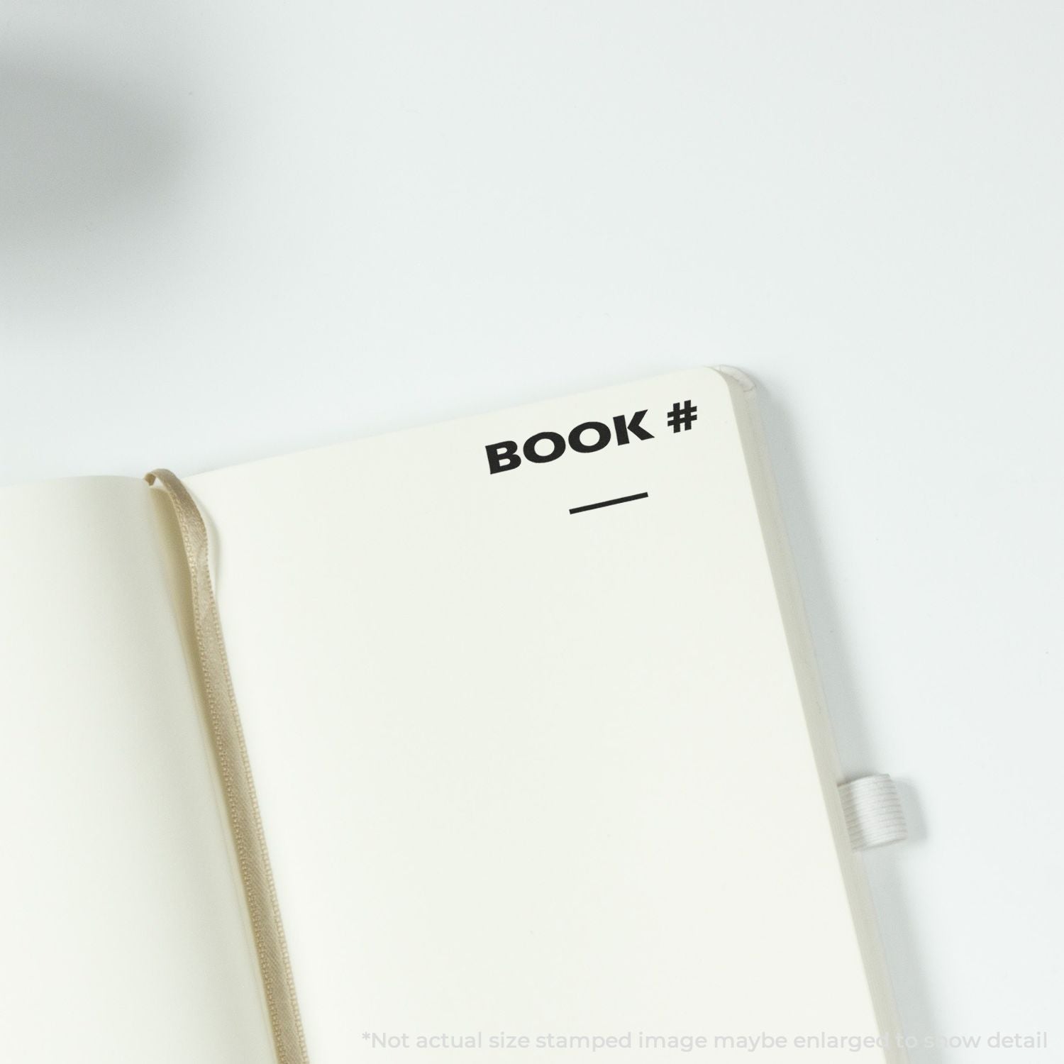 Minimal notebook cover with BOOK # label for branding, stationery and journal product photography on a white background.