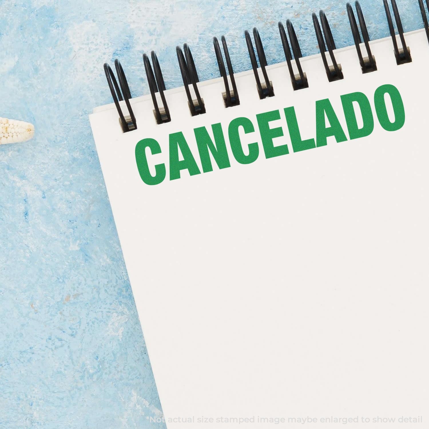 Green CANCELADO canceled stamp on a pinned white tag, used to label canceled appointments or orders on a blue background.