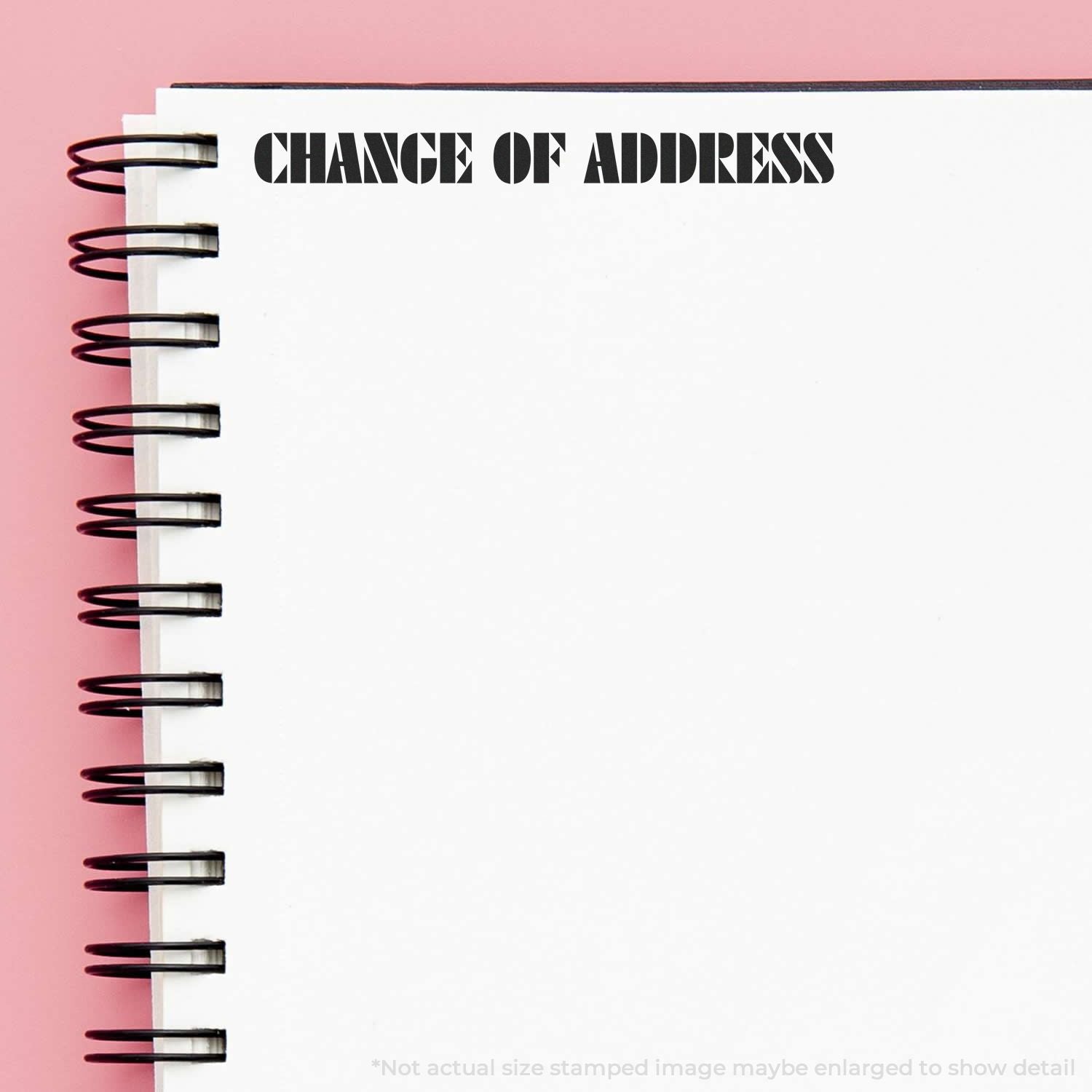 Change of address notice on a spiral notebookmoving reminder for updating your mailing address after relocation