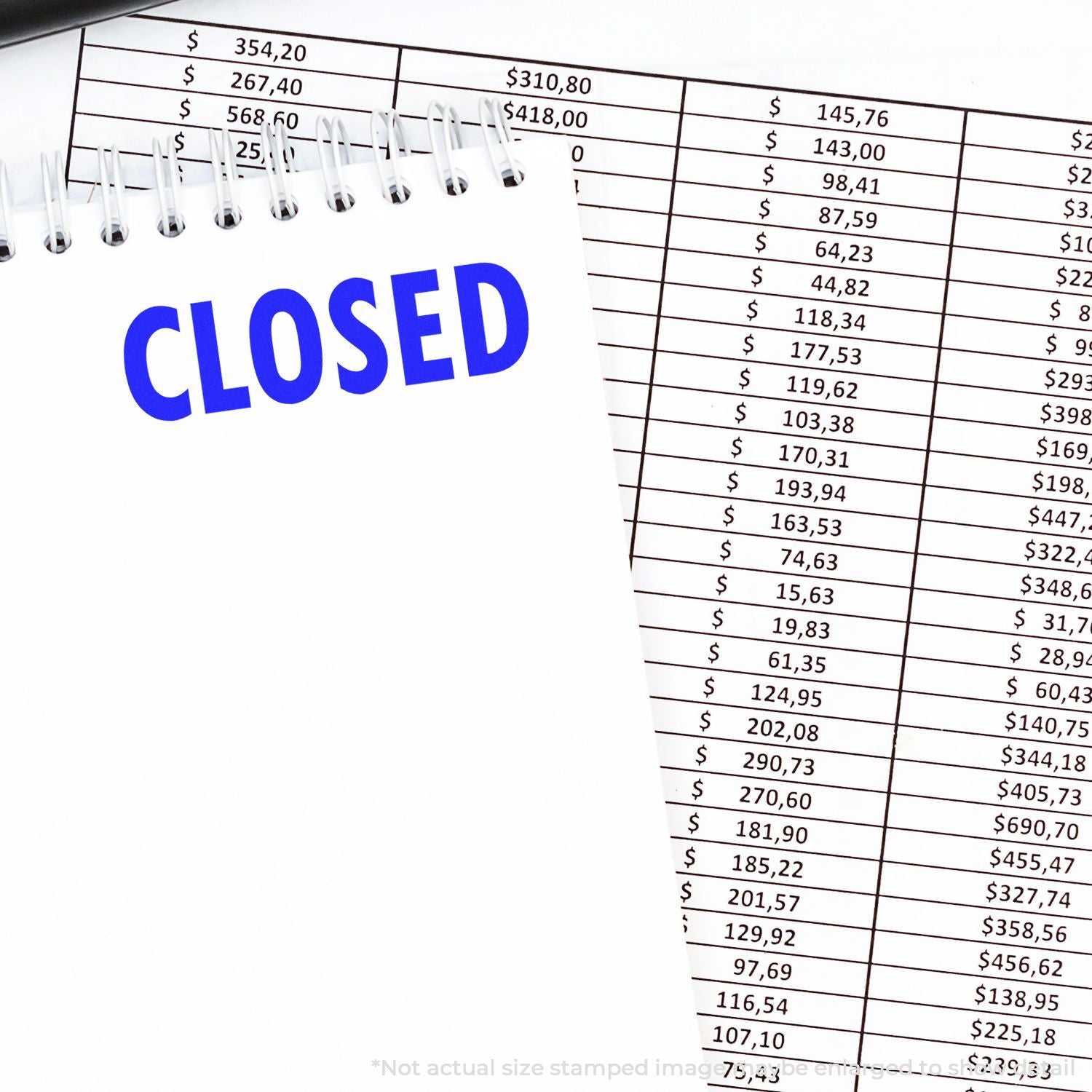 CLOSED sign over financial spreadsheet with dollar amounts, indicating a shut business and reviewed budget records for accounting