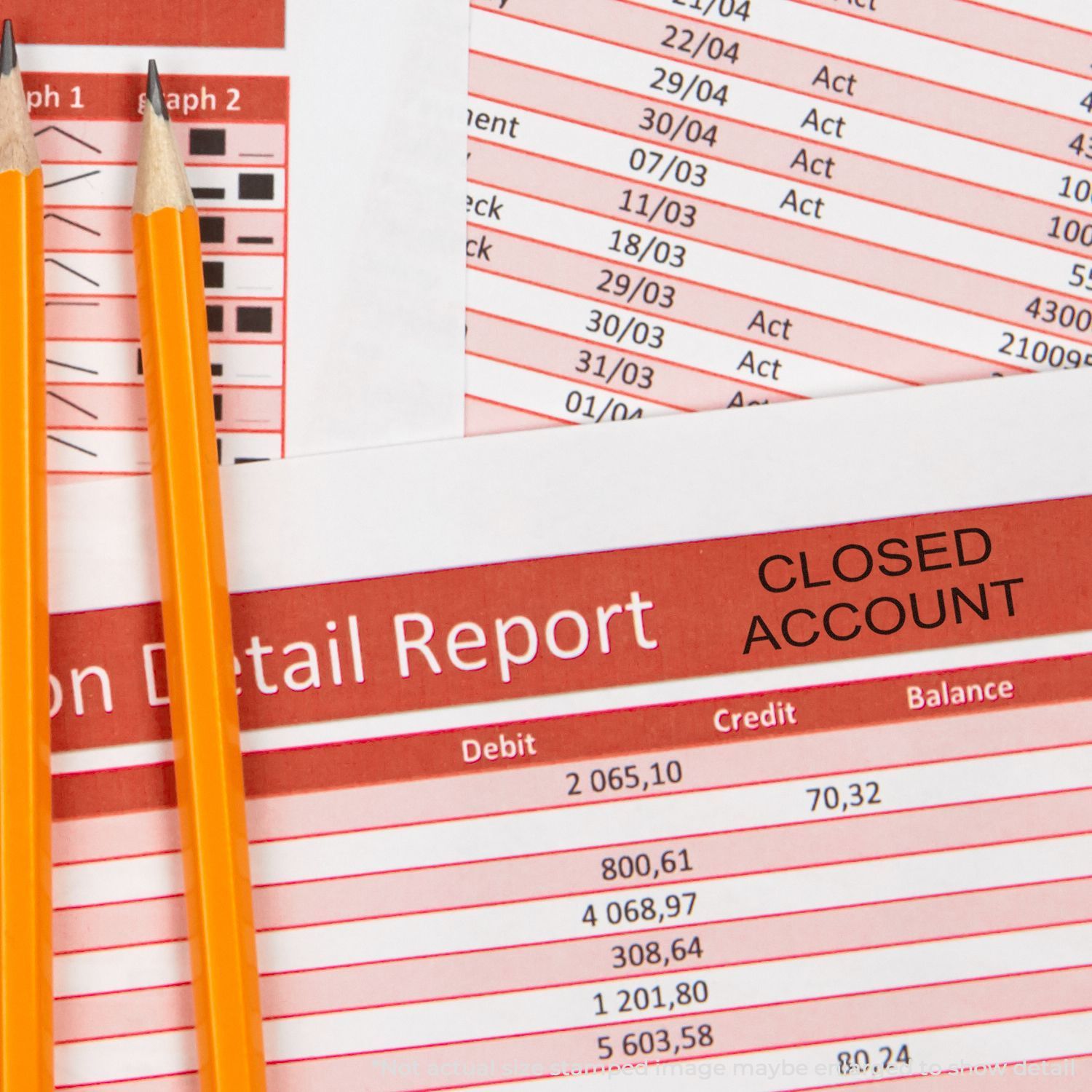 Yellow pencils on a closed account financial statement showing debit, credit, and balance details.