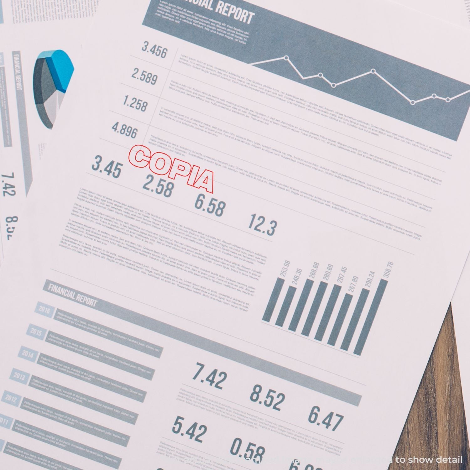 Financial report document with charts, graphs, and bar graphs on a desk, showing business analytics and financial data.
