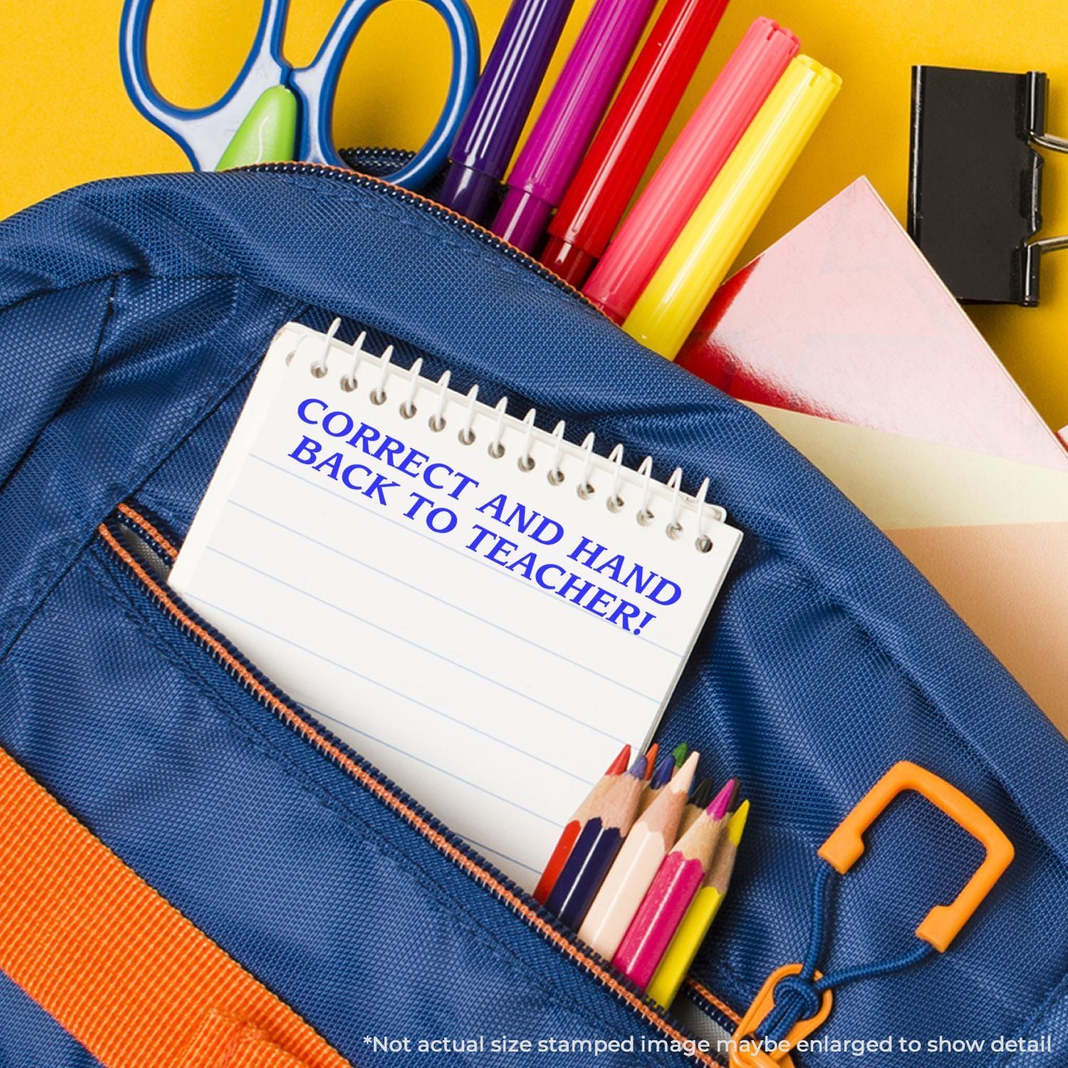 Back-to-school stationery: blue pencil case with worksheet note Correct and hand back to teacher? plus colorful pencils and markers.