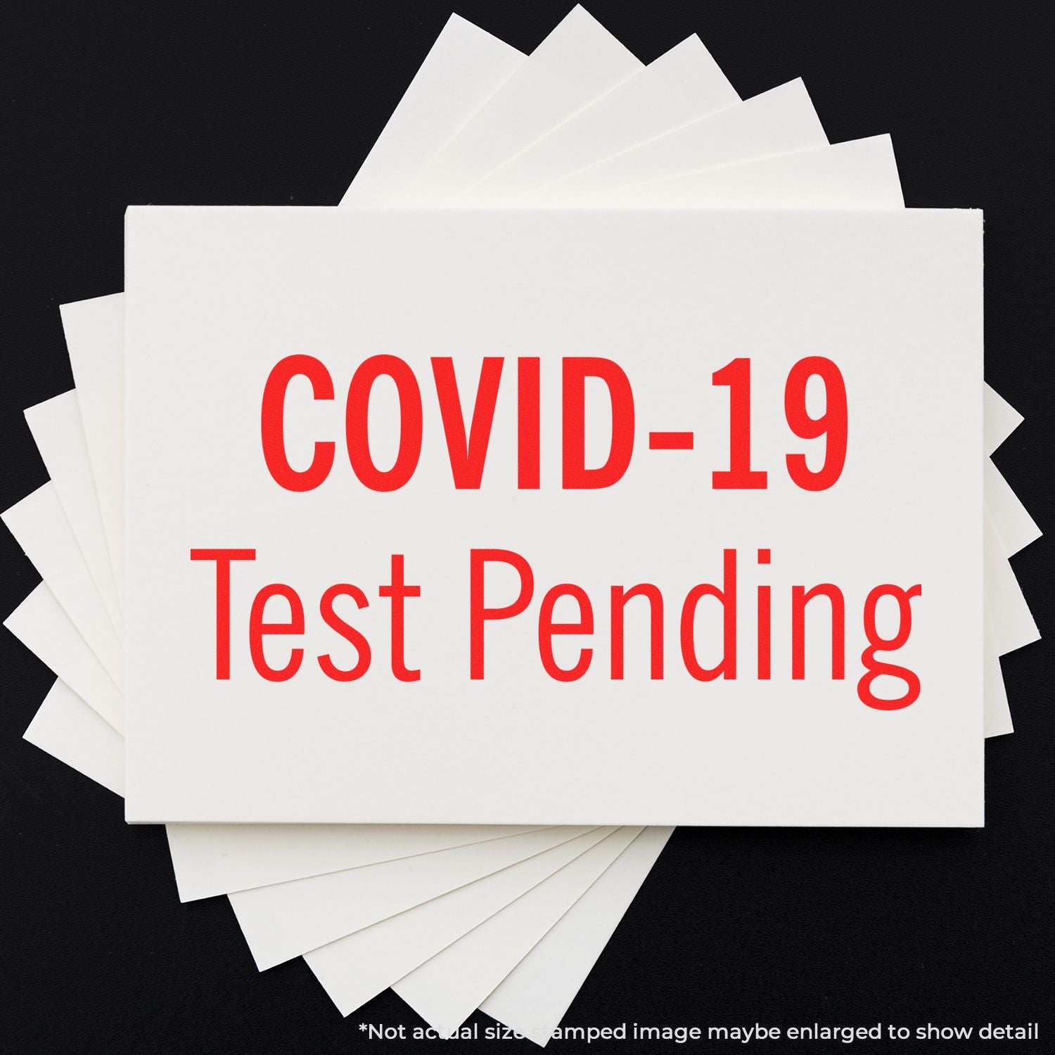 COVID-19 test pending message on white cards with stacked paper, illustrating waiting status notification for COVID-19 screening results.