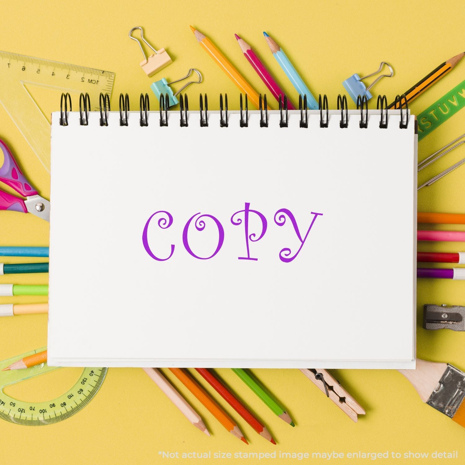 Copy handwritten note on blank notebook with pencils and ruler, featuring school stationery for writing practice.