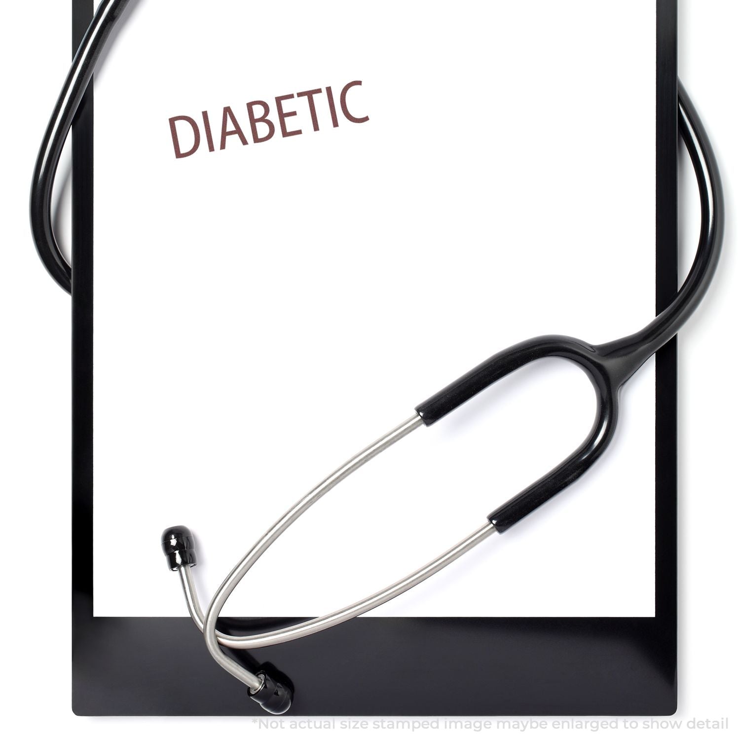 Stethoscope on clipboard with Diabetic text, representing diabetes diagnosis and medical healthcare concept.