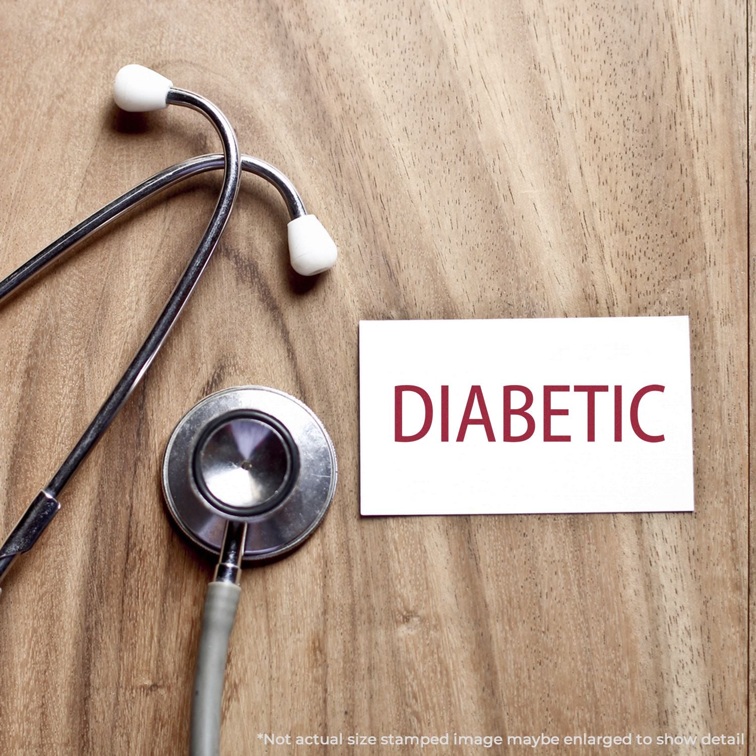 Medical stethoscope beside a card labeled DIABETIC, highlighting diabetes awareness, healthcare screening, and prevention.