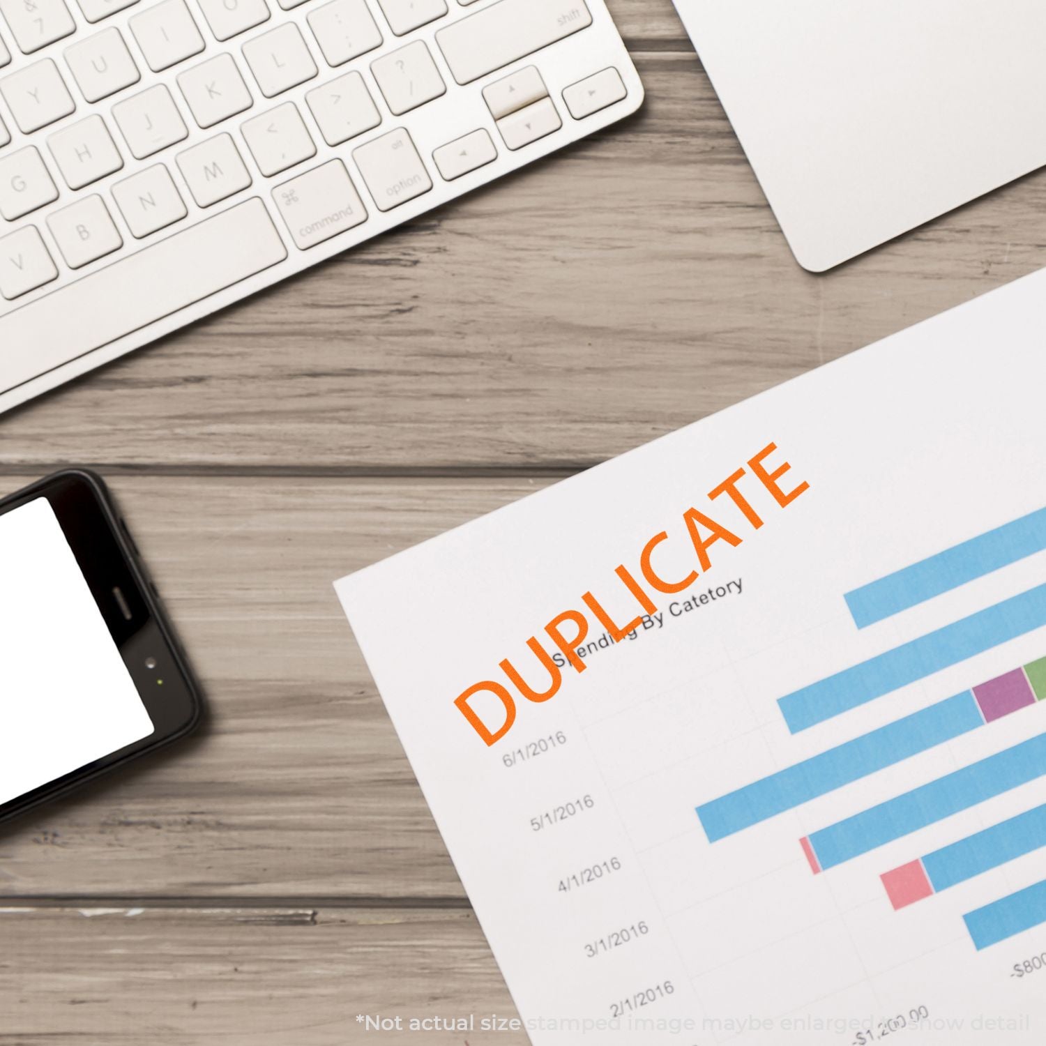Duplicate business report with bar chart on office desk beside keyboard and smartphone.