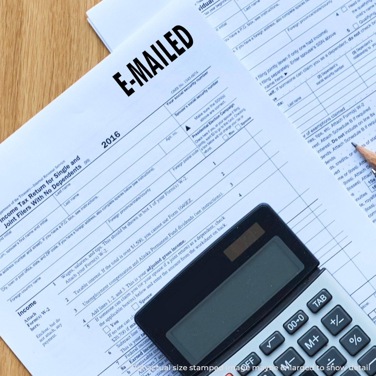 Income tax return forms with calculator and E-Filed stamp, illustrating tax filing, deductions, and e-mail tax preparation workflow