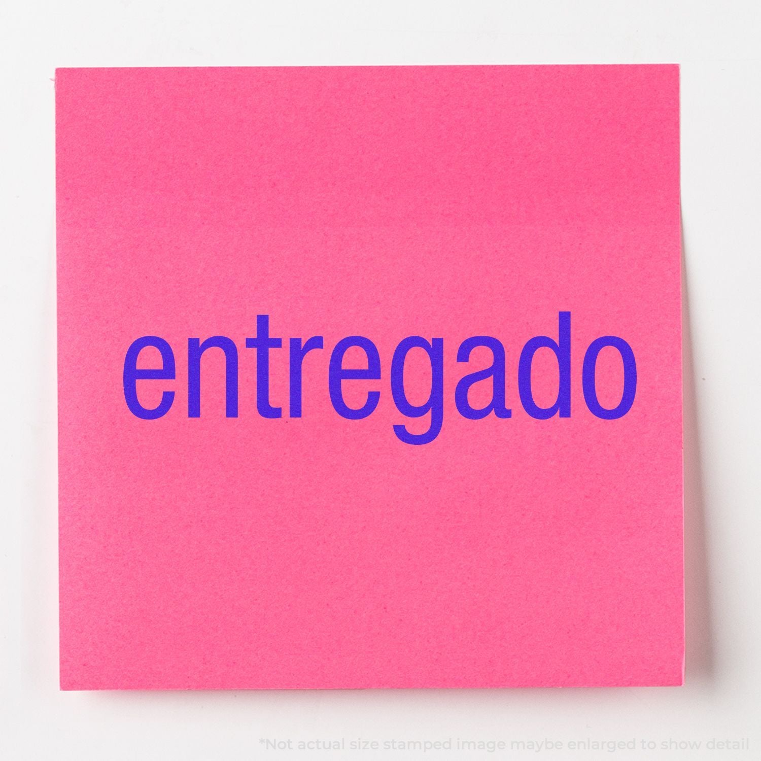 Pink sticky note with the word entregado in bold blue text on a white background.