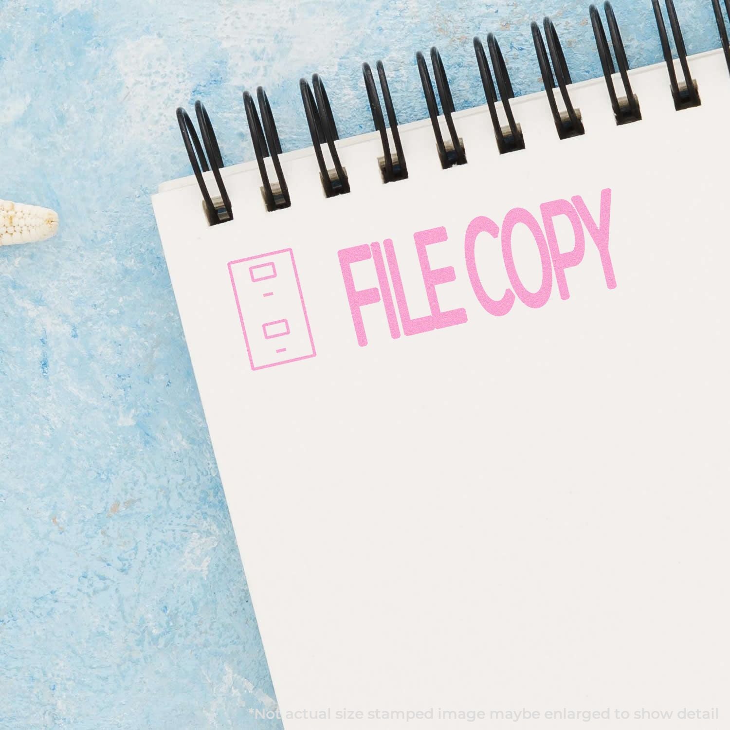 FILECOPY stamped design on white folder tab with black binder rings, promoting office document copying services on blue background