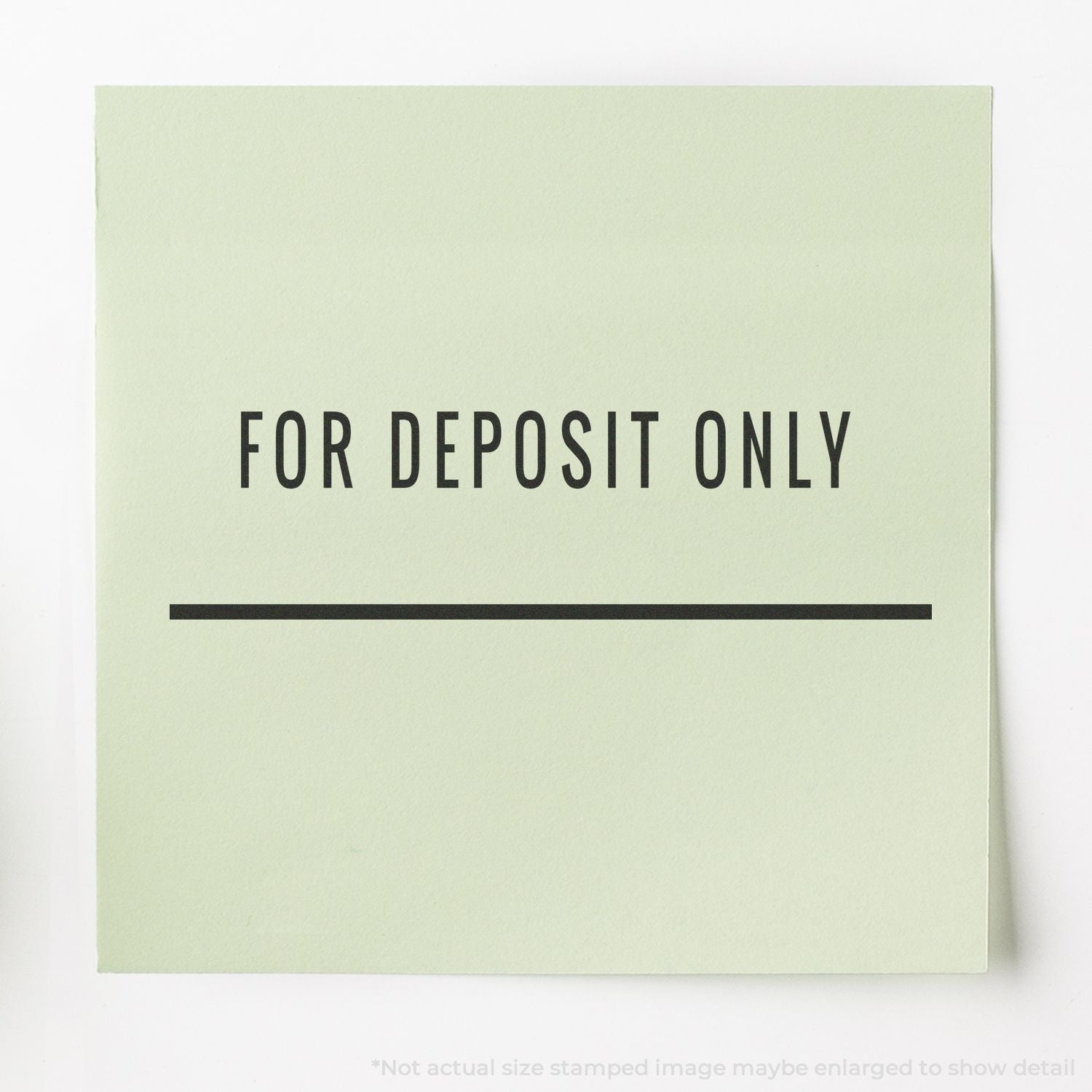 For deposit only sign on green paper, directing customers where to submit authorized banking deposits for teller and ATM processing.