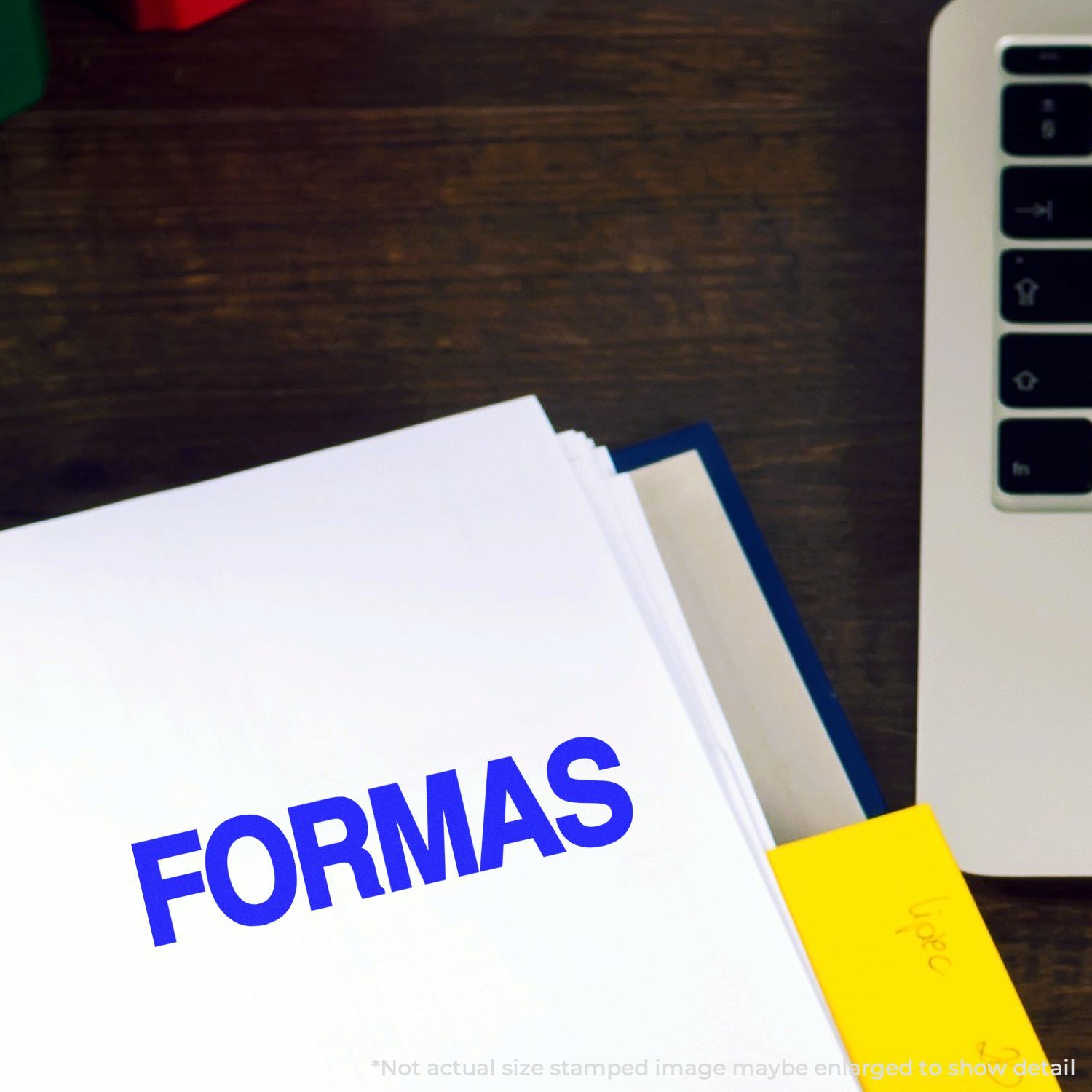 Forms paperwork with blue FORMS label, yellow file tab, and smartphone screen icons on desk for completing documents.