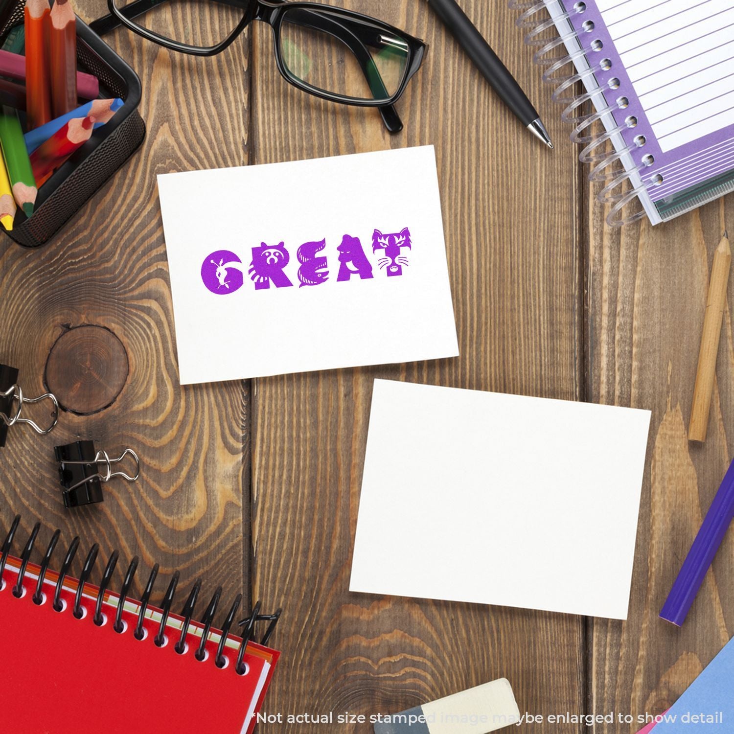 Creative desk flat lay with colorful stationery, notebook, glasses, and a white card featuring the word GREAT in purple lettering.
