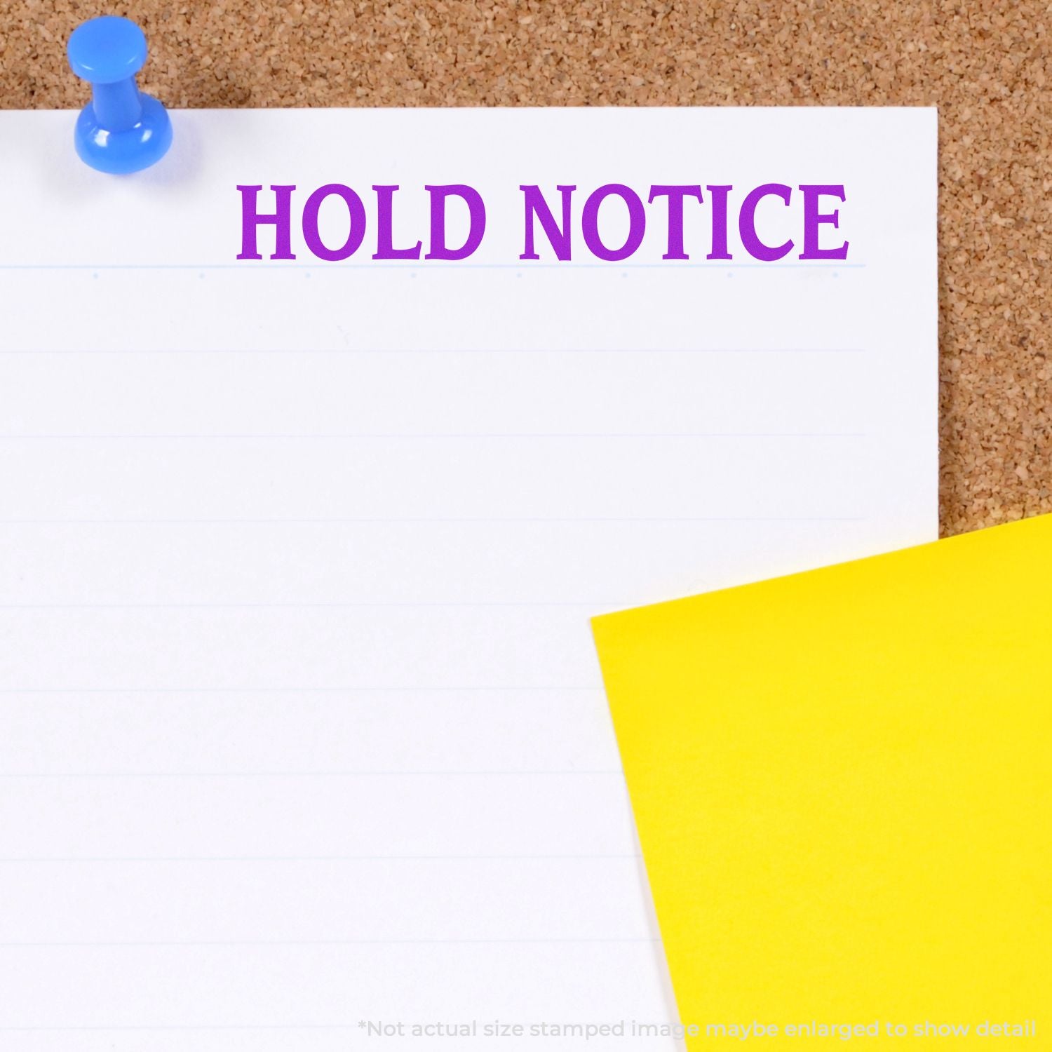 Hold notice reminder note pinned on corkboard with blue tack and yellow sticky note for safety alerts.