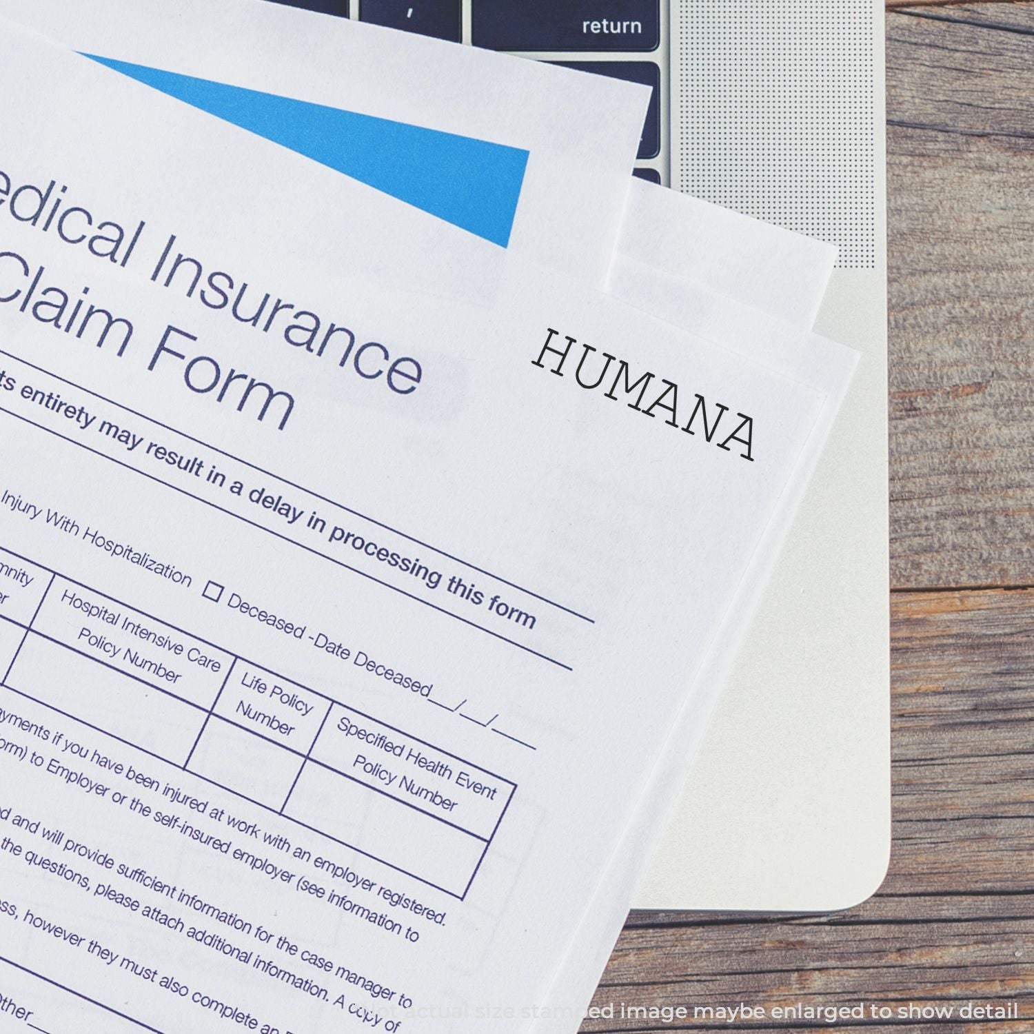 Humana life insurance claim form marked 'HUMANA' and 'deceased,' showing paperwork for processing insurance benefits.