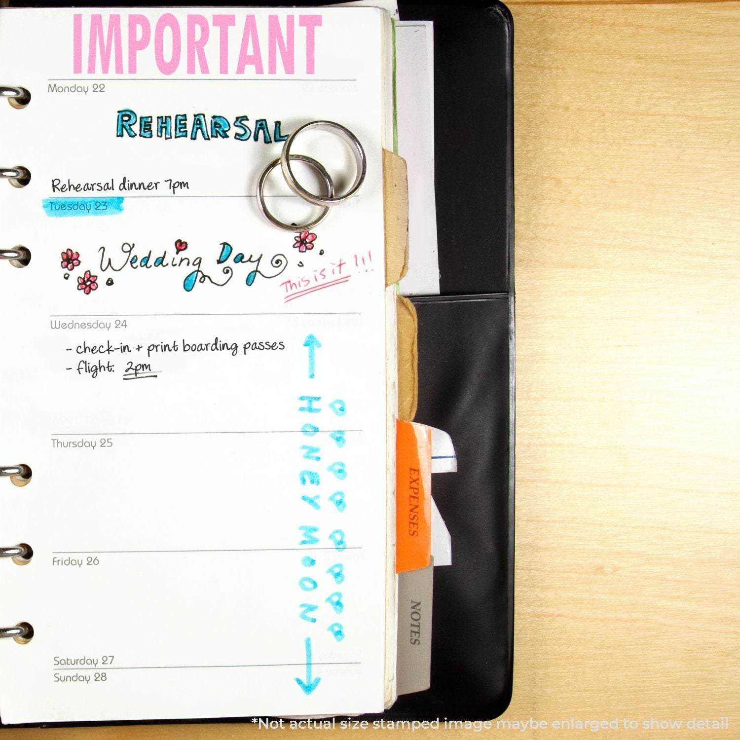 Weekly planner page titled Important with wedding day notes, rehearsal dinner, and travel check-in/flight details on a desk.