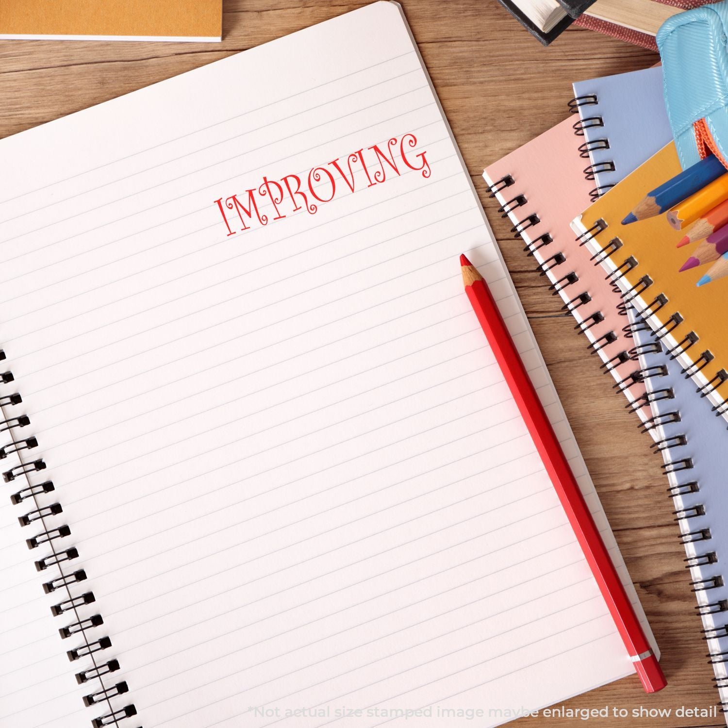 Notebook with Improving written on blank lined paper, red pencil, and colorful school supplies on a wooden desk, concept of education and self-improvement