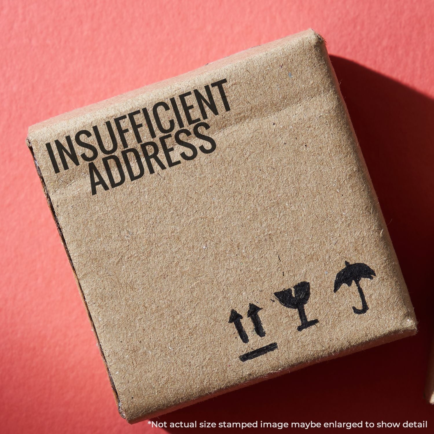Close-up of Insufficient Address postal stamp on a mail envelope, indicating undeliverable address for return delivery issues.