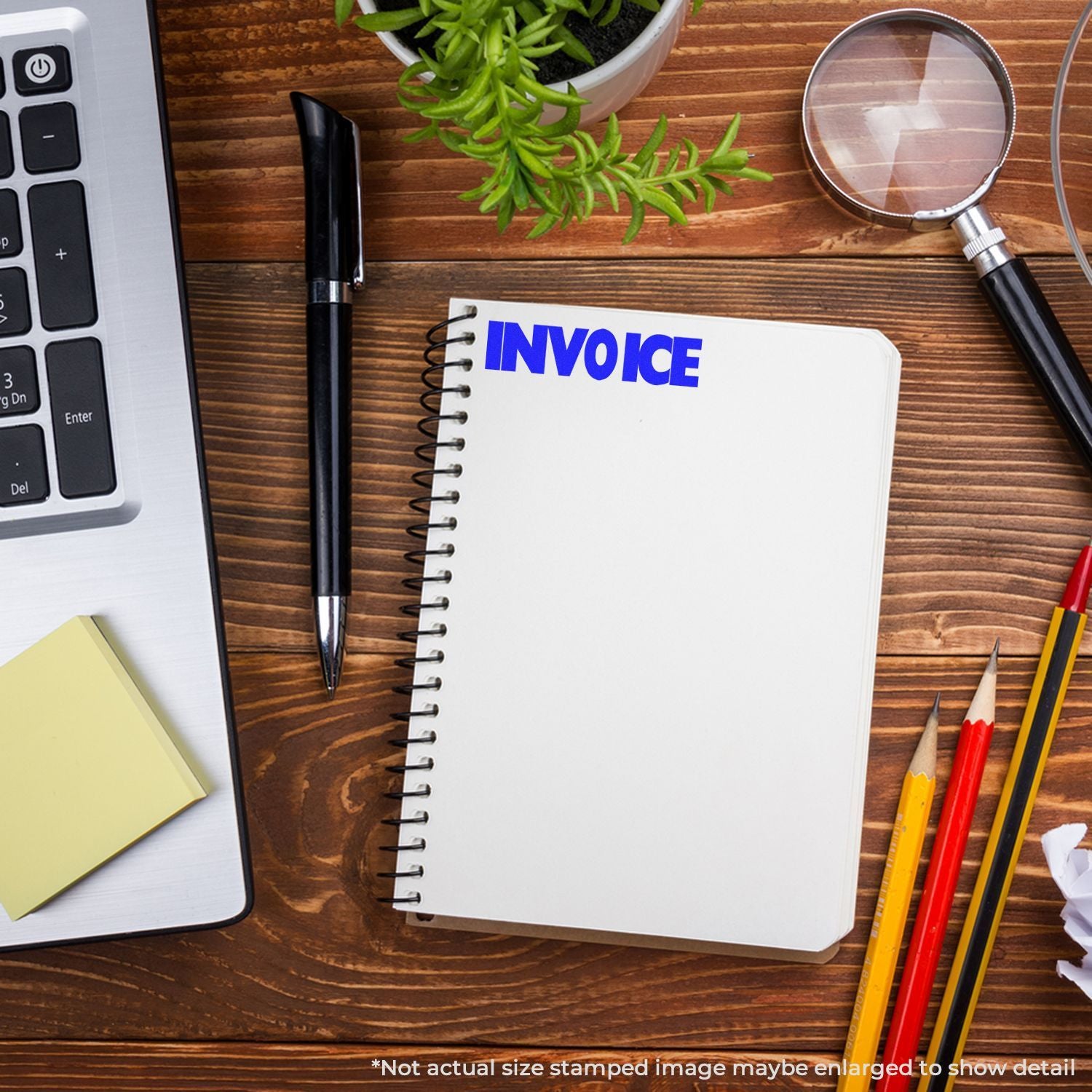Invoice document on notepad with magnifying glass and pens on office deskaccounting review and billing documentation concept