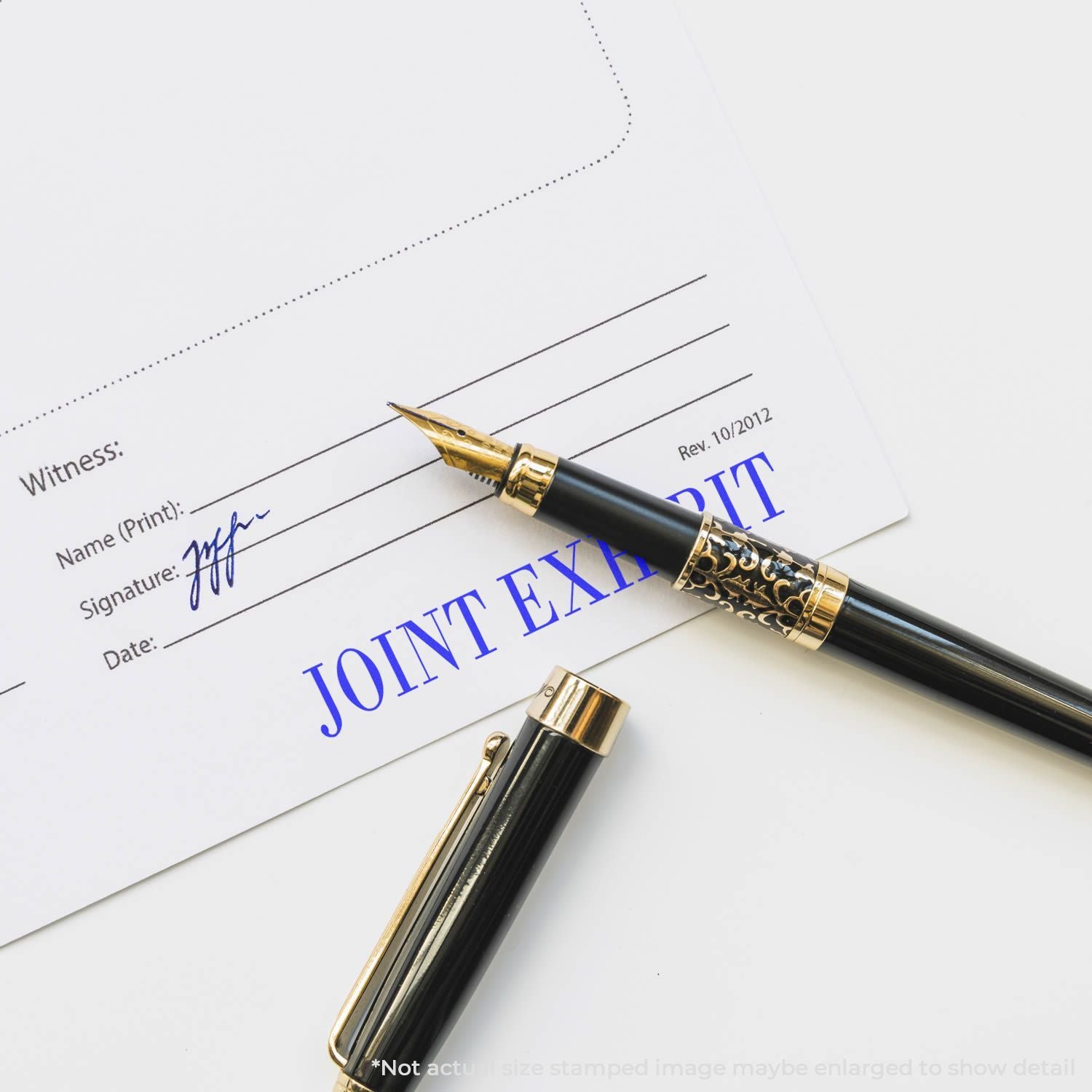 Fountain pen on signed legal document with Joint Exhibit stamp and witness signature lines