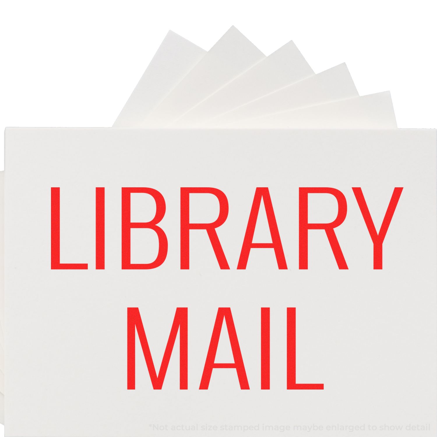 Library Mail packaging with red LIBRARY MAIL text and stacked inserts, protecting library materials during shipping.