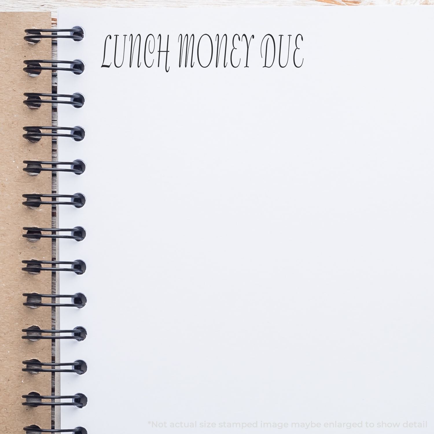 Spiral notebook page with LUNCH MONEY DUE text, blank memo space, and black coil binding on the left.