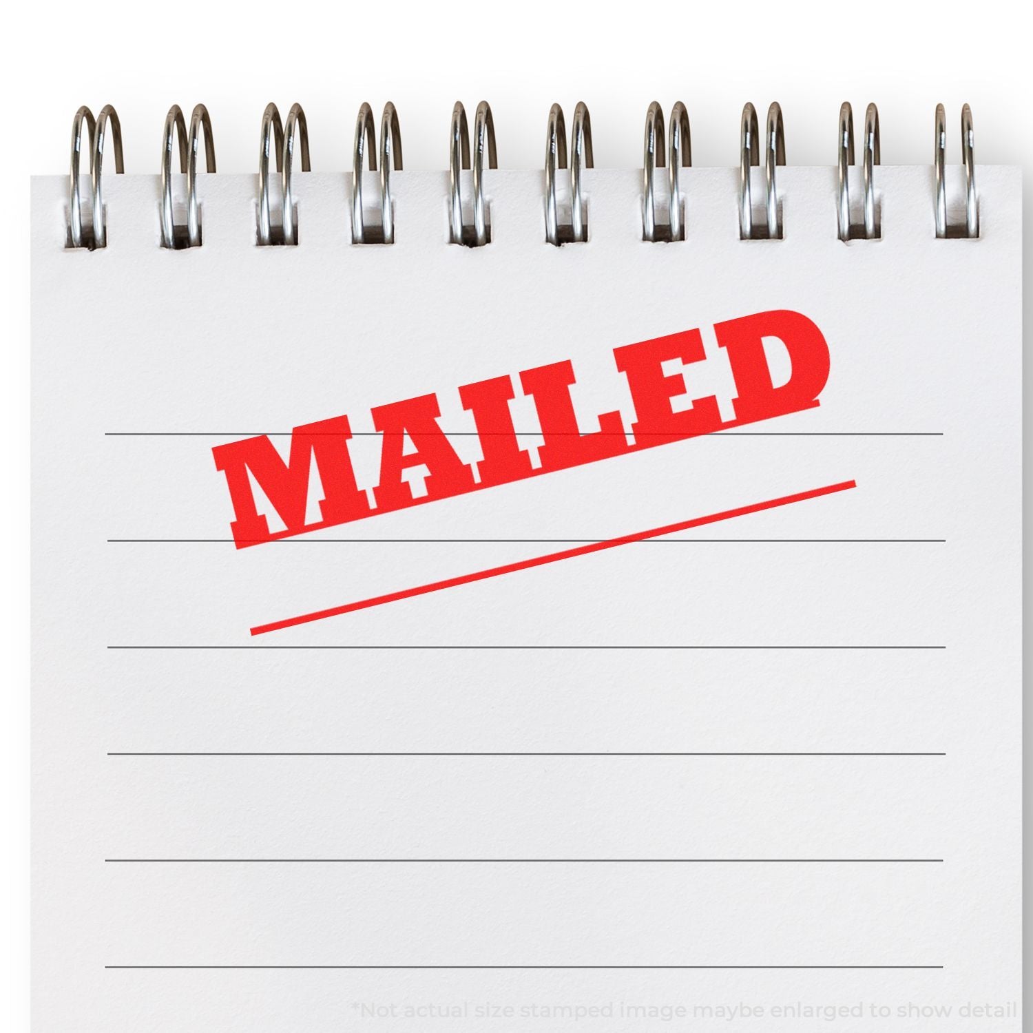 Notebook page stamped with red MAILED text, representing mailed correspondence, postage, and office paperwork.