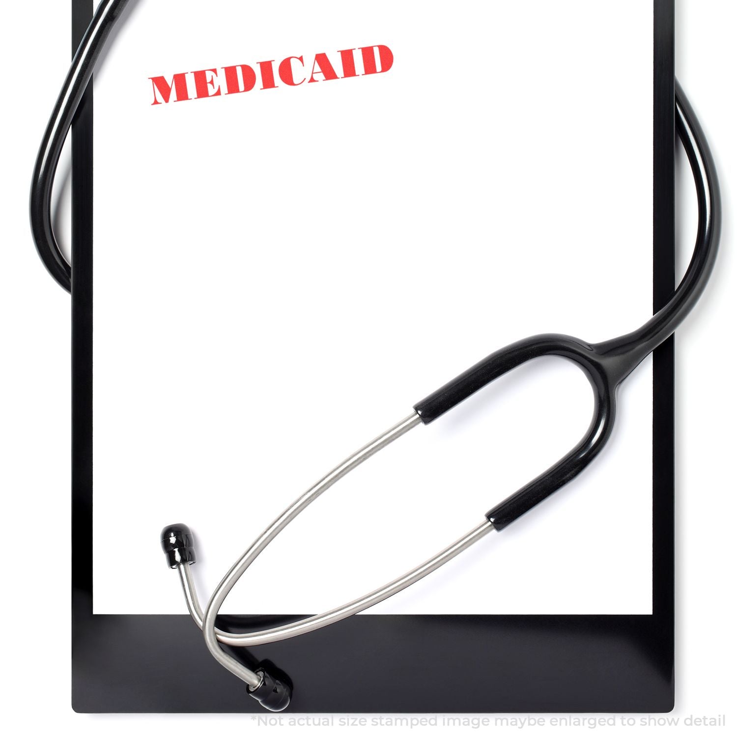 Stethoscope on clipboard with Medicaid form, healthcare insurance and medical benefits concept