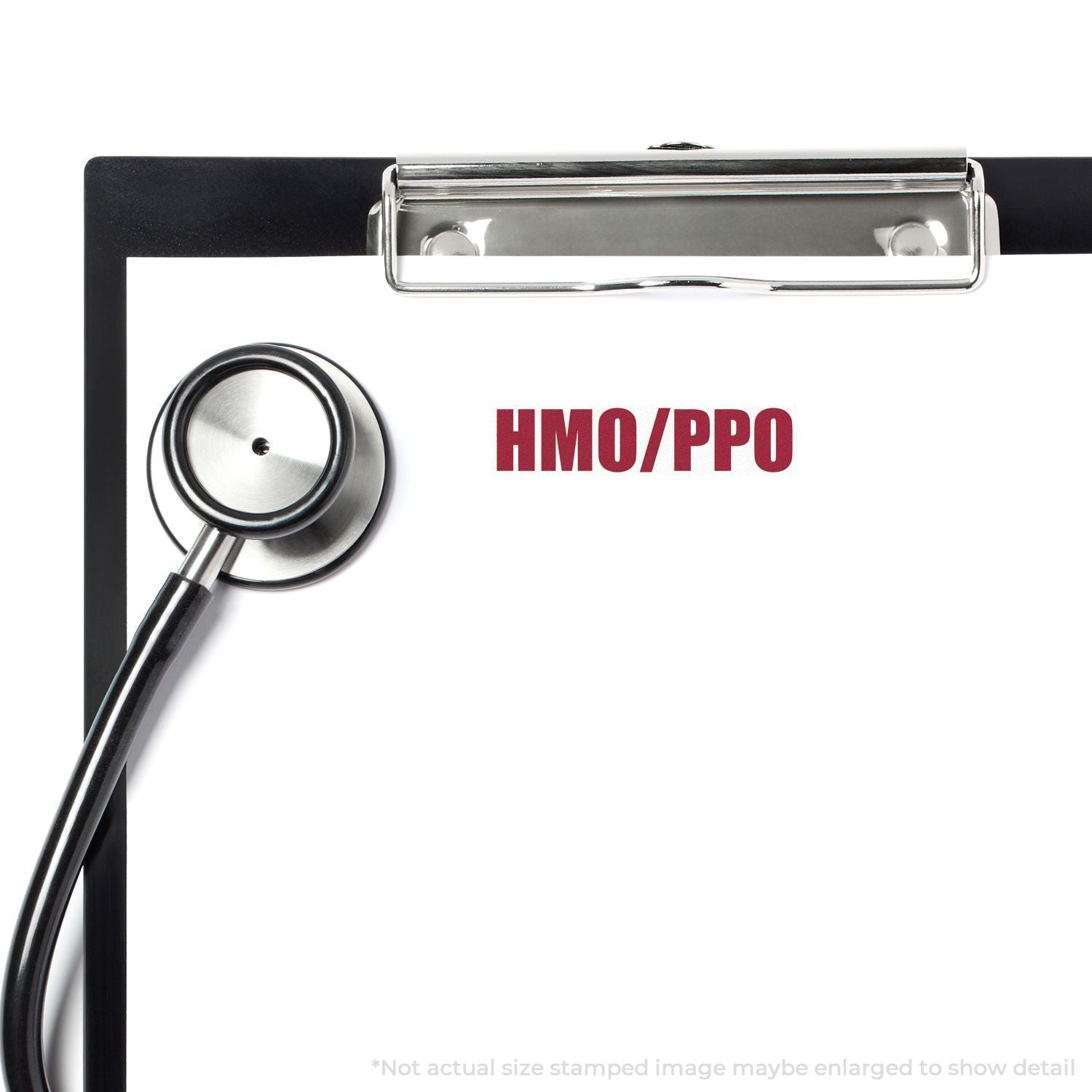 Clipboard with stethoscope and HMO/PPO text, healthcare insurance plan concept image
