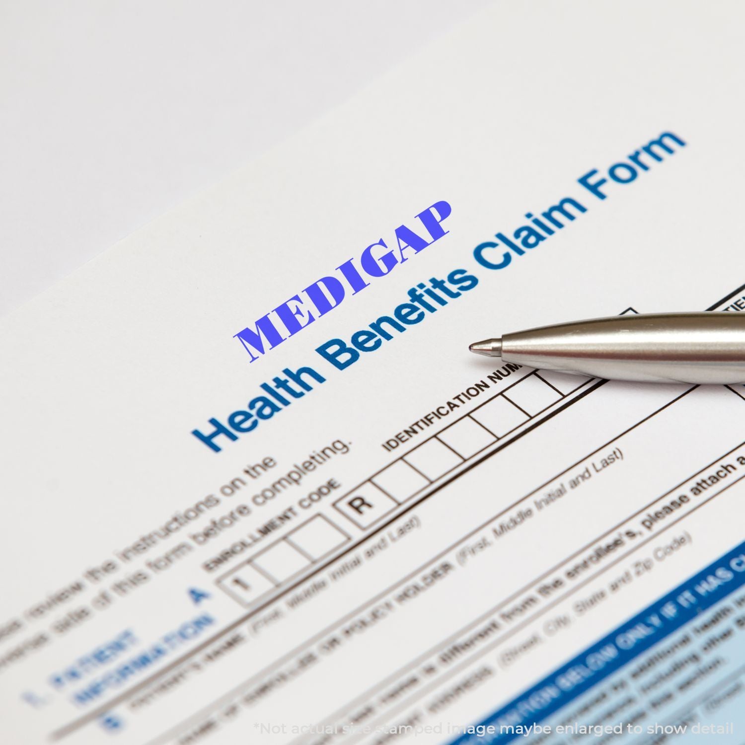 Medical ID and health benefits claim form with pen, showing healthcare documentation and enrollment for benefits.