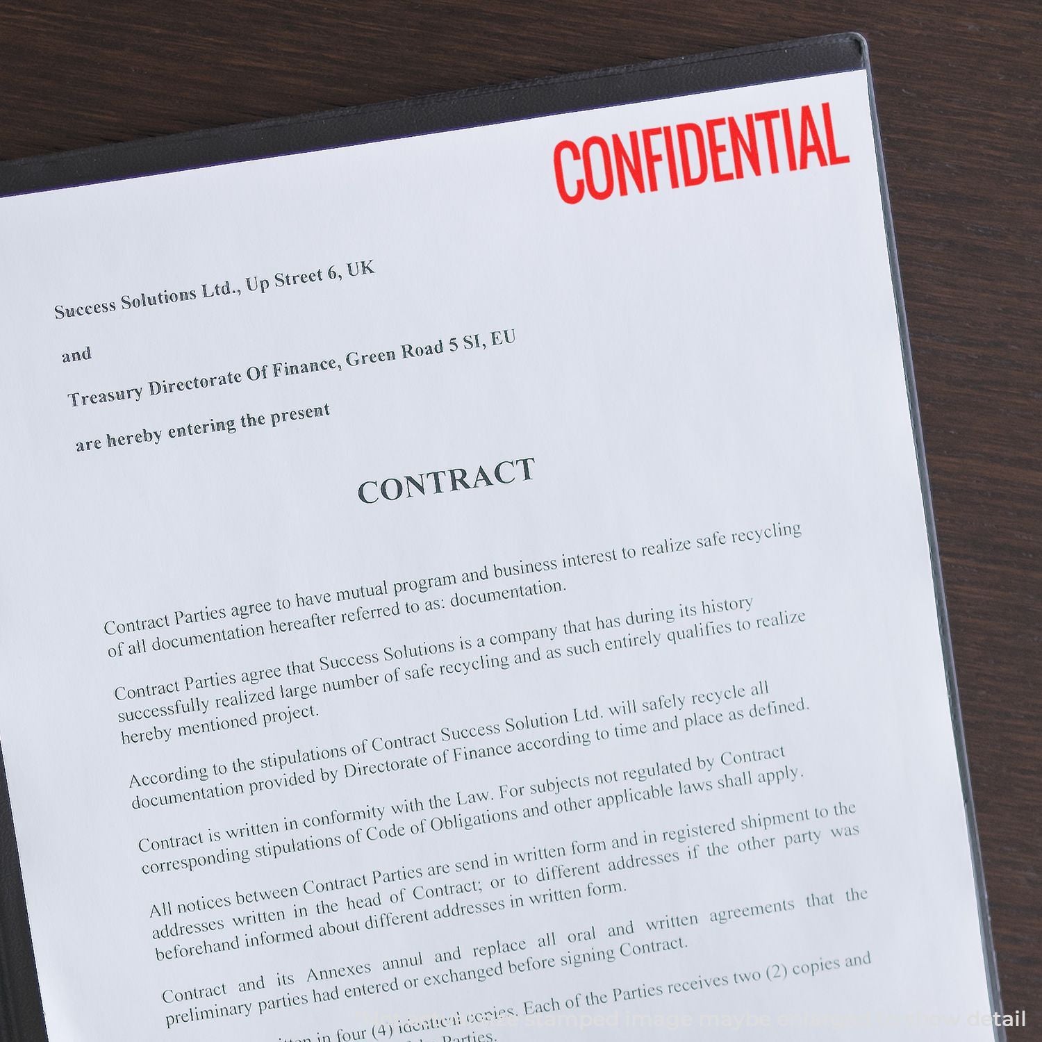 Confidential contract document labeled CONFIDENTIAL, showing business agreement terms for recycling and corporate compliance.