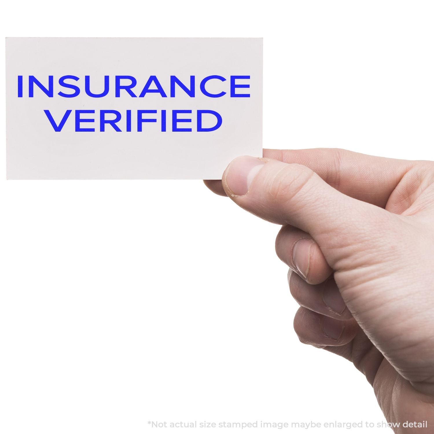 Hand holding Insurance Verified card, communicating insurance verification for confirmed coverage status.