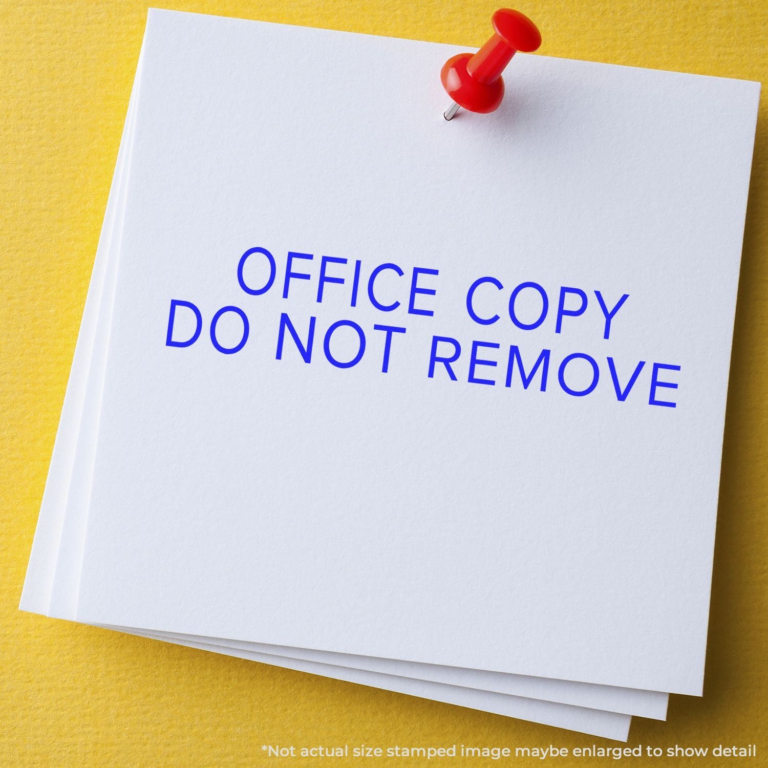 Office copy do not remove notice pinned to stacked white paper on a yellow background.