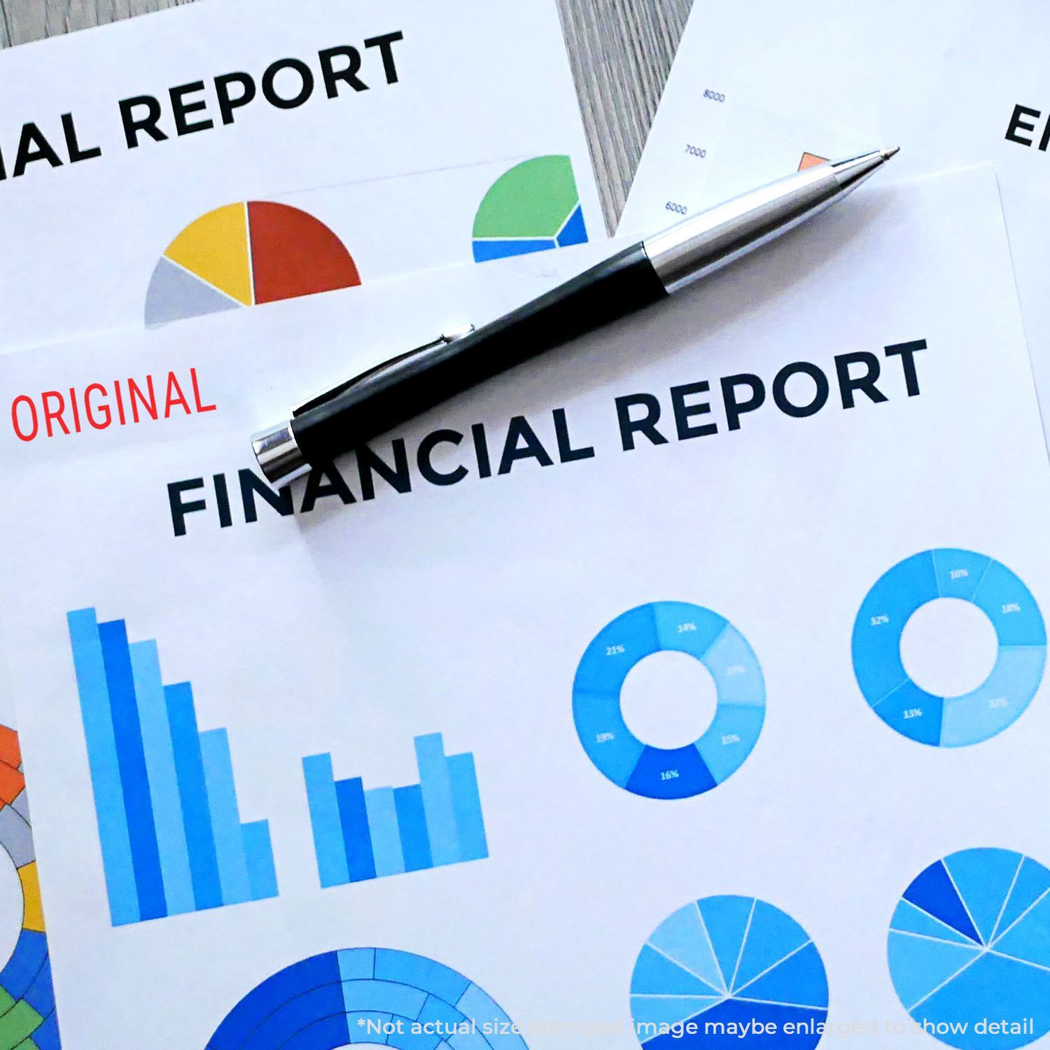 Financial report documents with colorful charts and a pen, business analytics and accounting performance data.