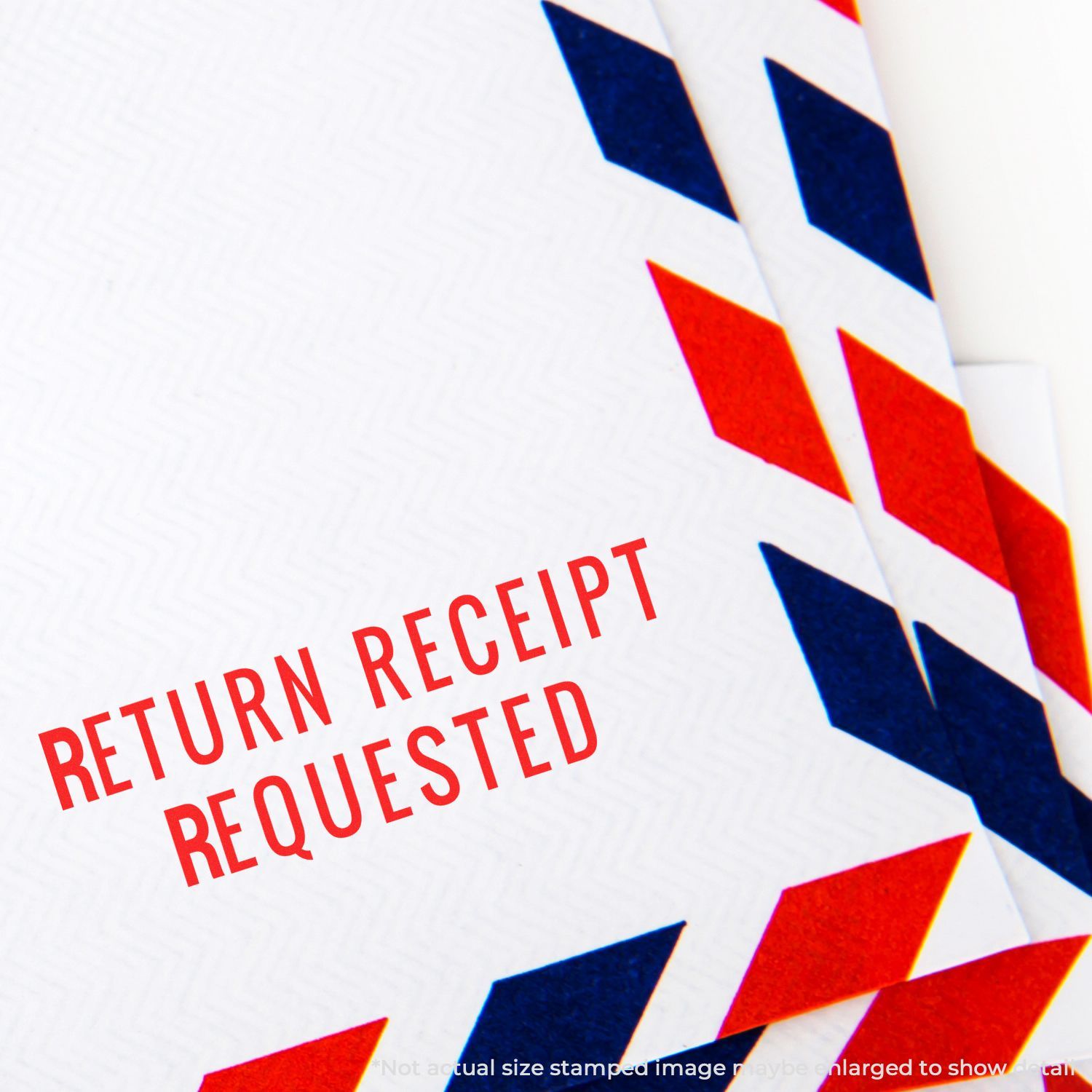 Return receipt required stamp on a postal document, featuring red and blue starburst design for mail tracking.