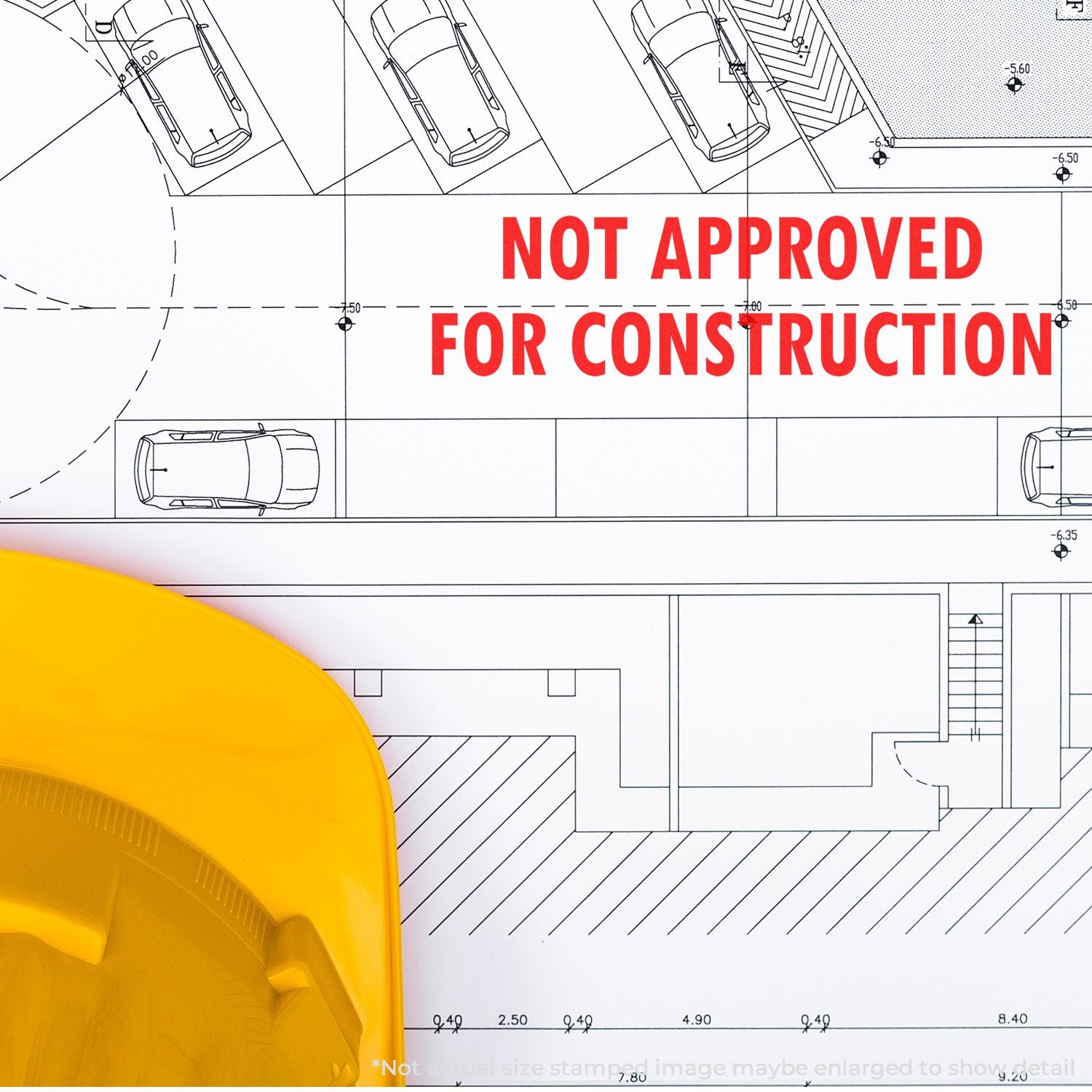 Engineering site plan blueprint marked NOT APPROVED FOR CONSTRUCTION with vehicle layout and yellow hard hat in foreground