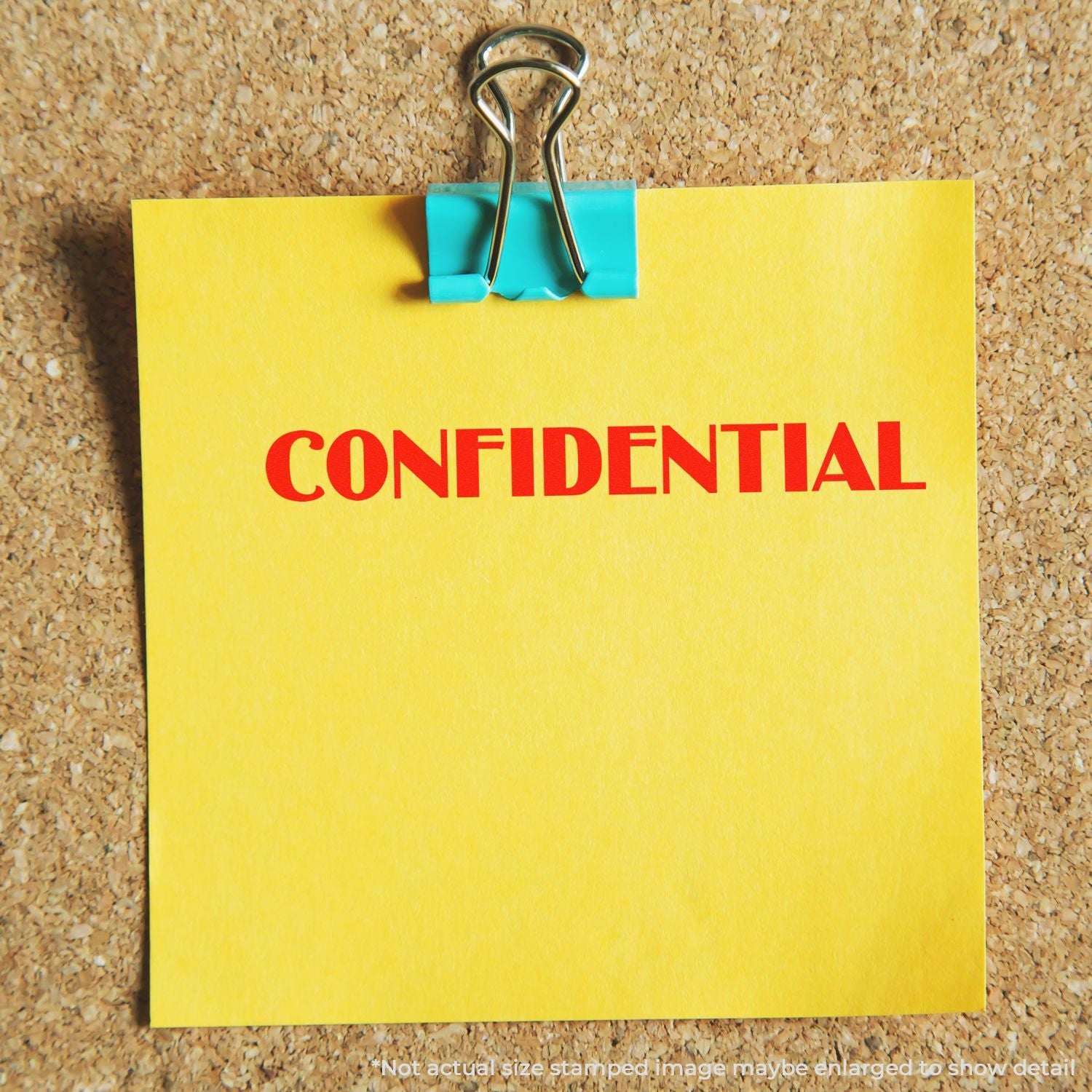 CONFIDENTIAL paper clipped on corkboard, highlighting private documents, data security, and confidentiality.