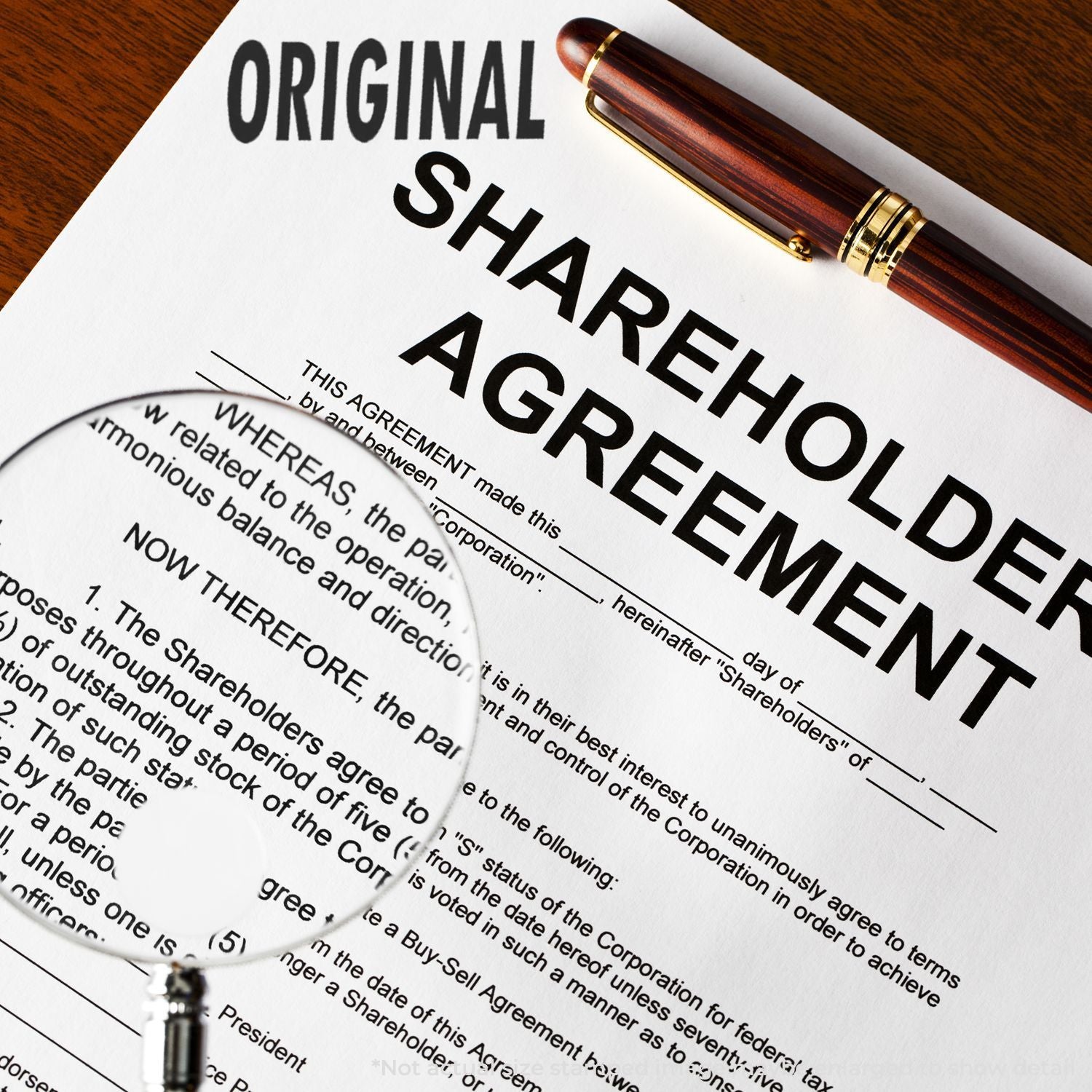 Original shareholder agreement document review with pen and magnifying glass, highlighting legal contract terms and corporate compliance.