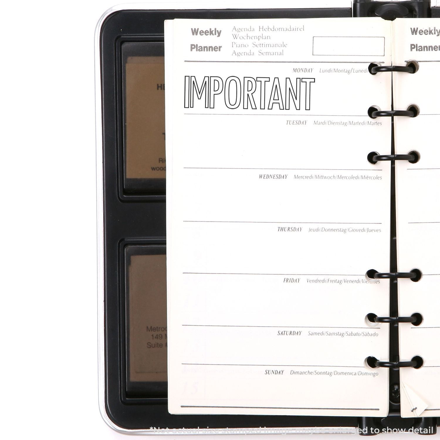 Weekly planner notebook with IMPORTANT section and daily schedule pages on a discbound binder system.